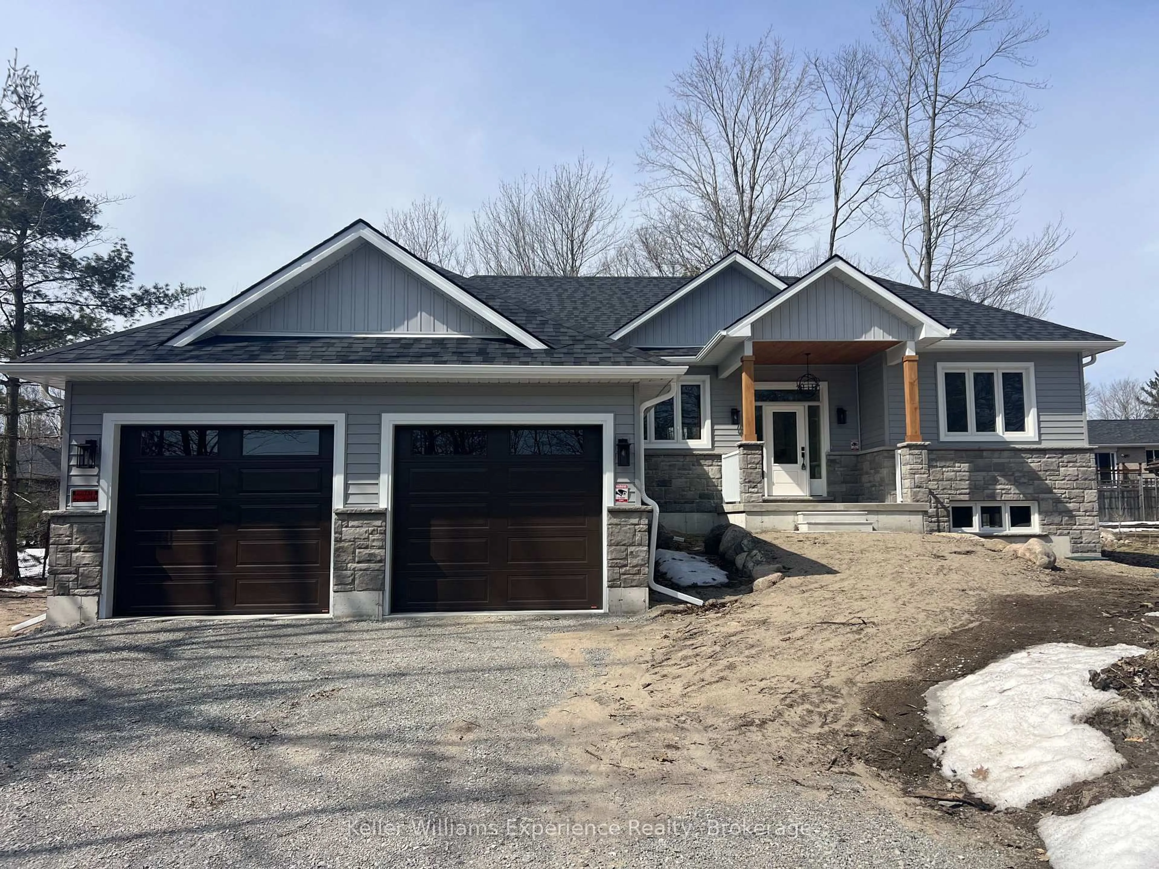 Home with brick exterior material, street for 62 Rue Vanier, Tiny Ontario L9M 0J2