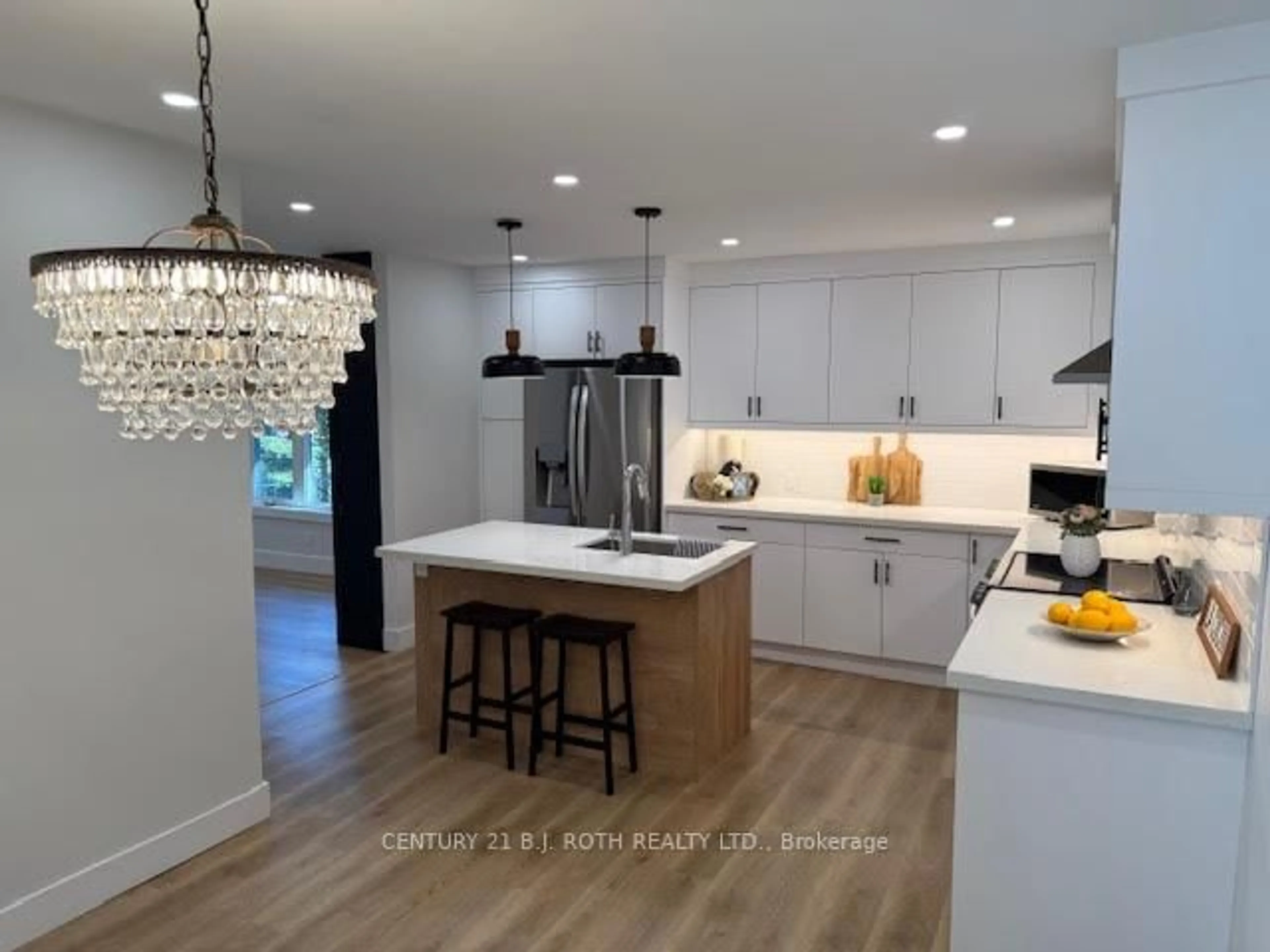 Open concept kitchen, unknown for 86 Doran Rd, Springwater Ontario L0L 1X0