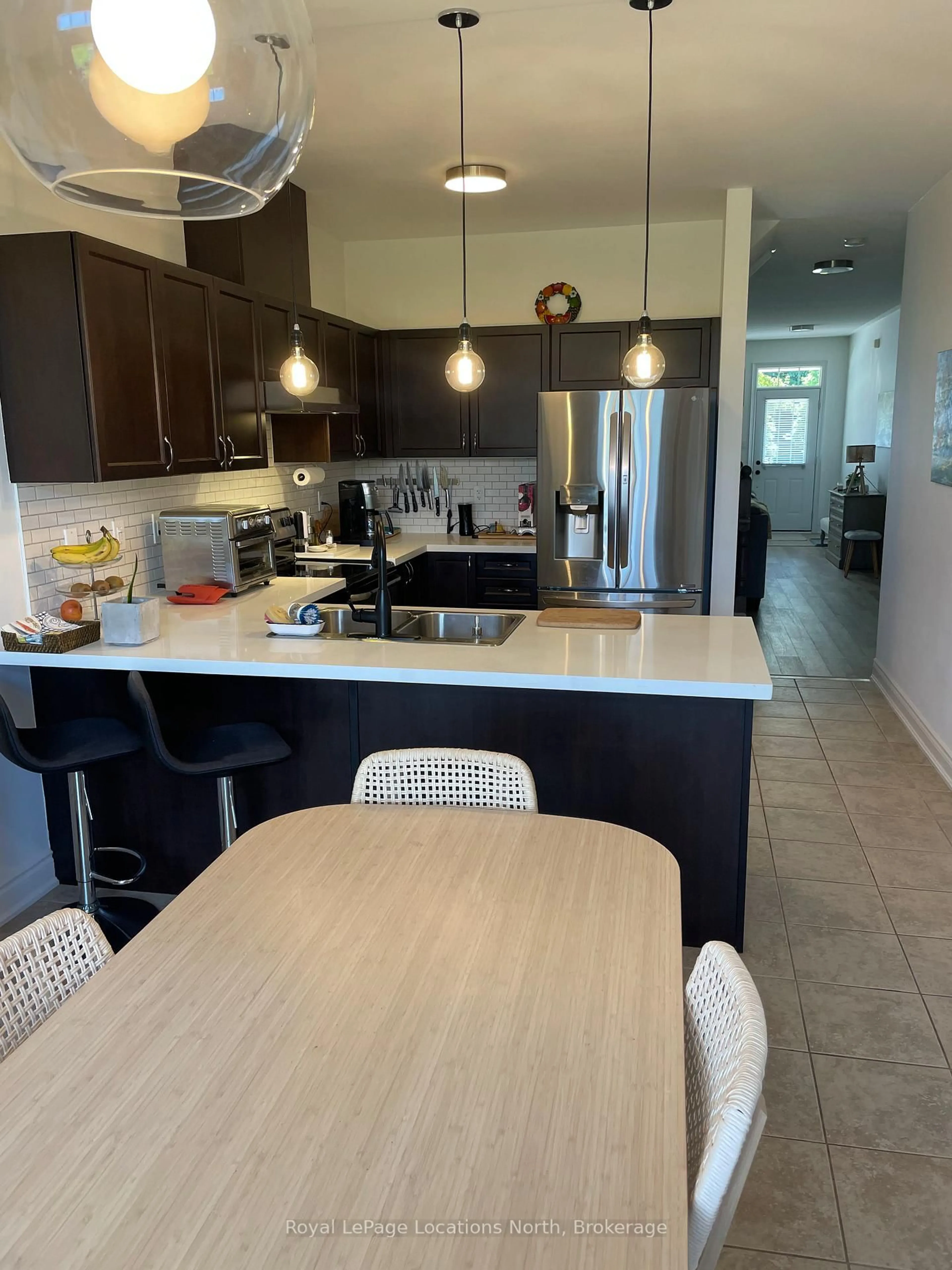 Open concept kitchen, ceramic/tile floor for 32 Berkshire Ave, Wasaga Beach Ontario L9Z 0G3