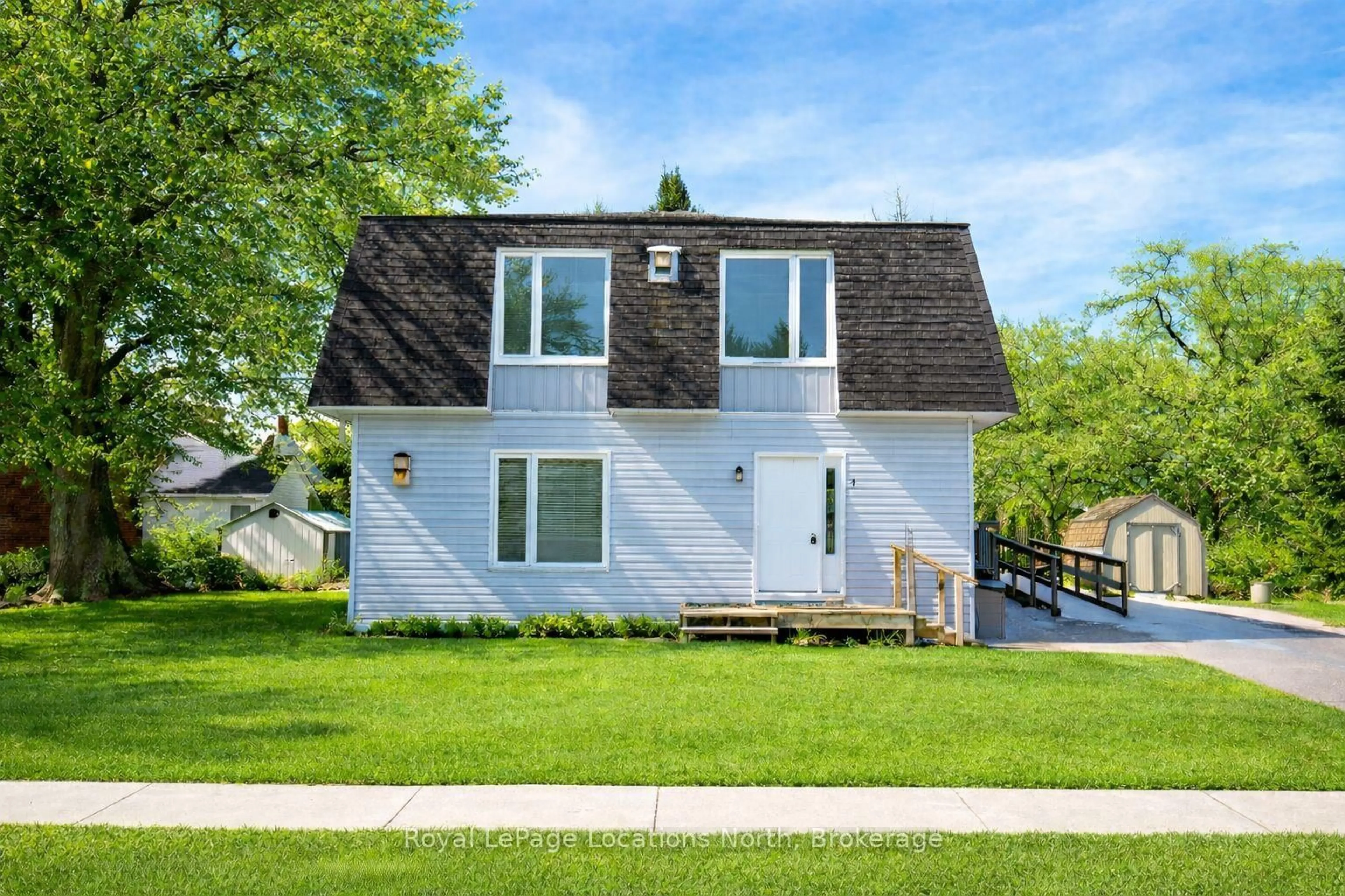 Home with vinyl exterior material, street for 4 Shaw St, Springwater Ontario L0L 1P0