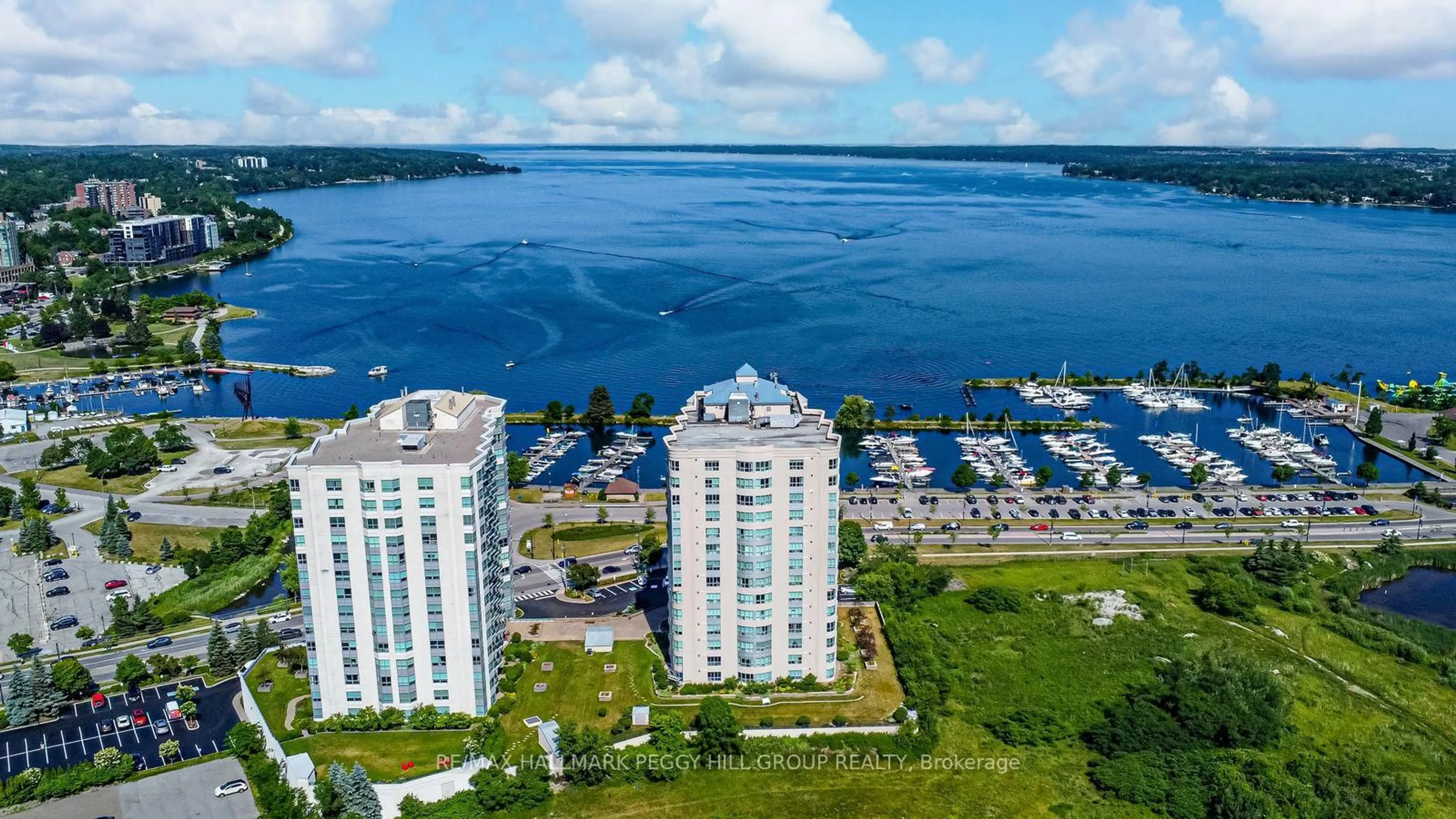 A pic from outside/outdoor area/front of a property/back of a property/a pic from drone, water/lake/river/ocean view for 2 Toronto St #PH2/3, Barrie Ontario L4N 9R2