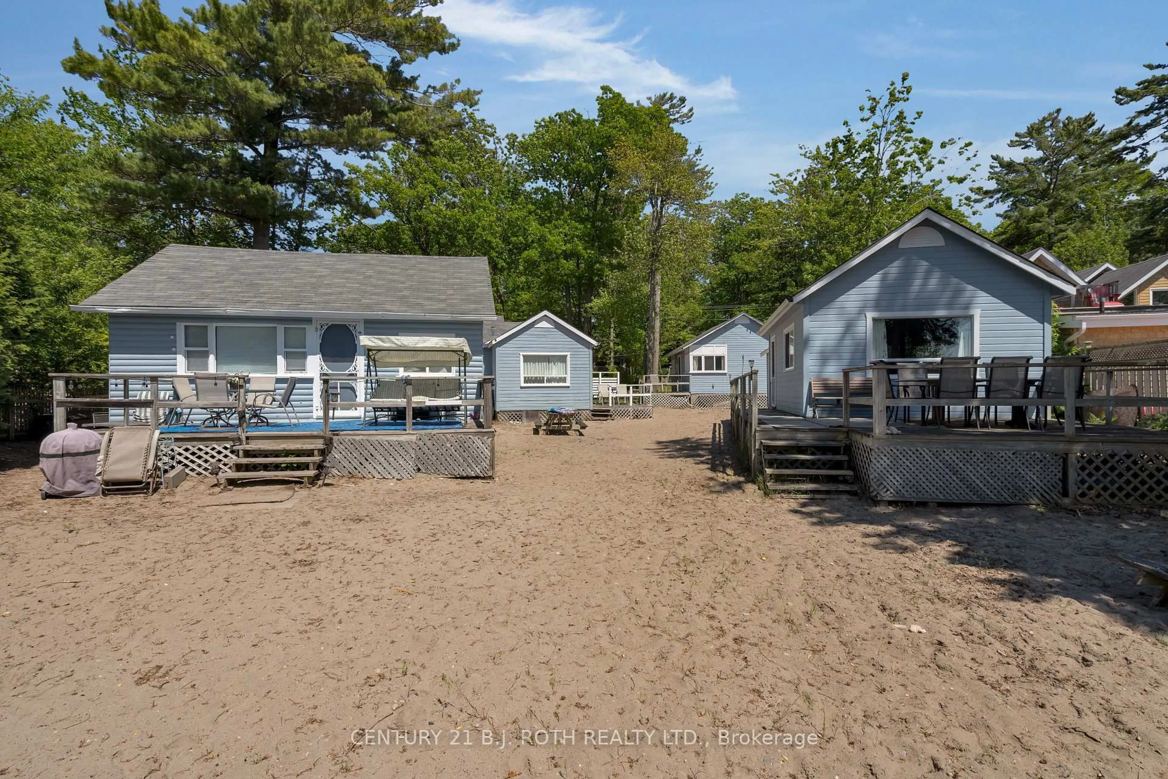 A pic from outside/outdoor area/front of a property/back of a property/a pic from drone, street for 2026 Tiny Beaches Rd, Tiny Ontario L0L 1P1