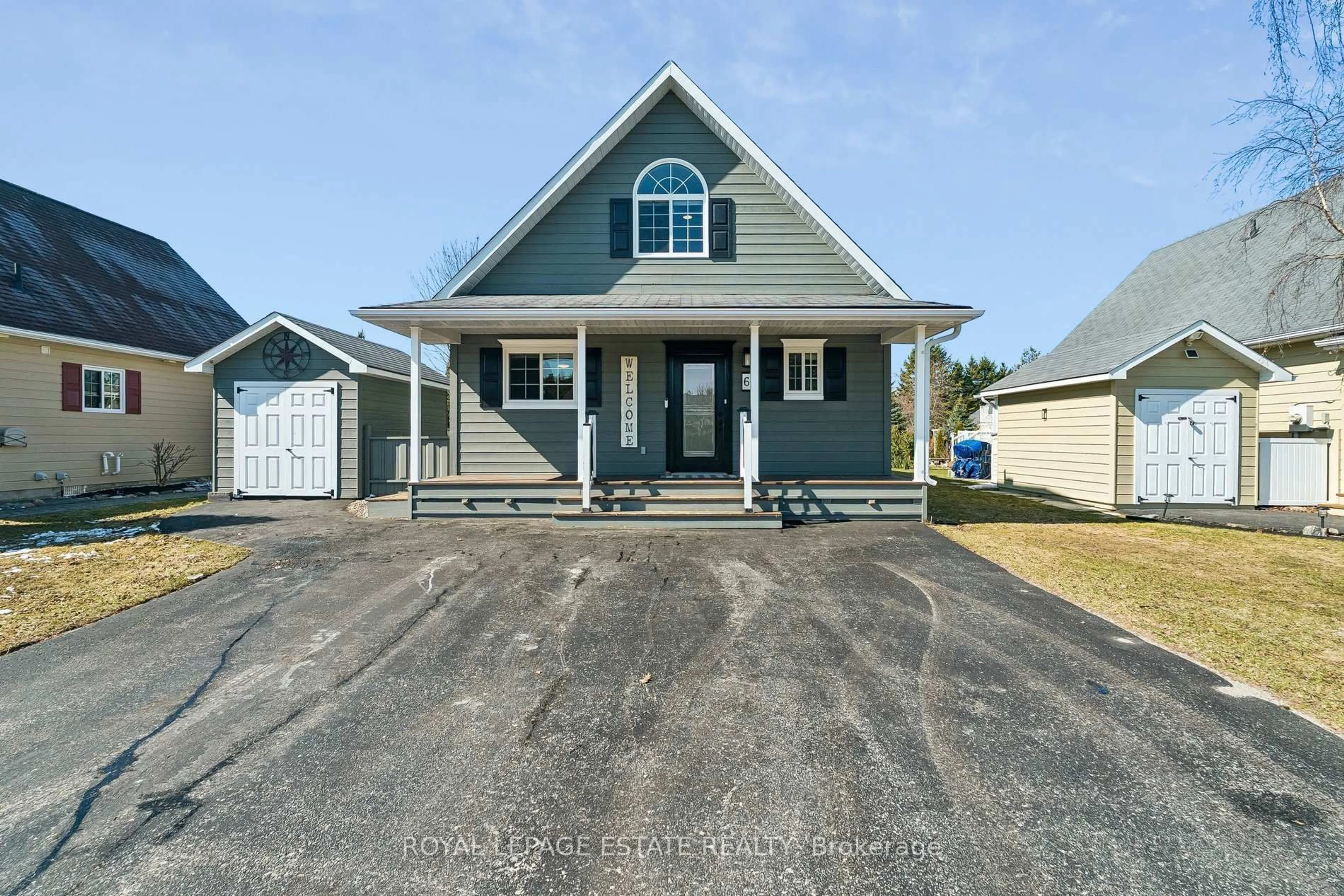 Home with vinyl exterior material, street for 6 Temagami Tr, Wasaga Beach Ontario L9Z 1X7