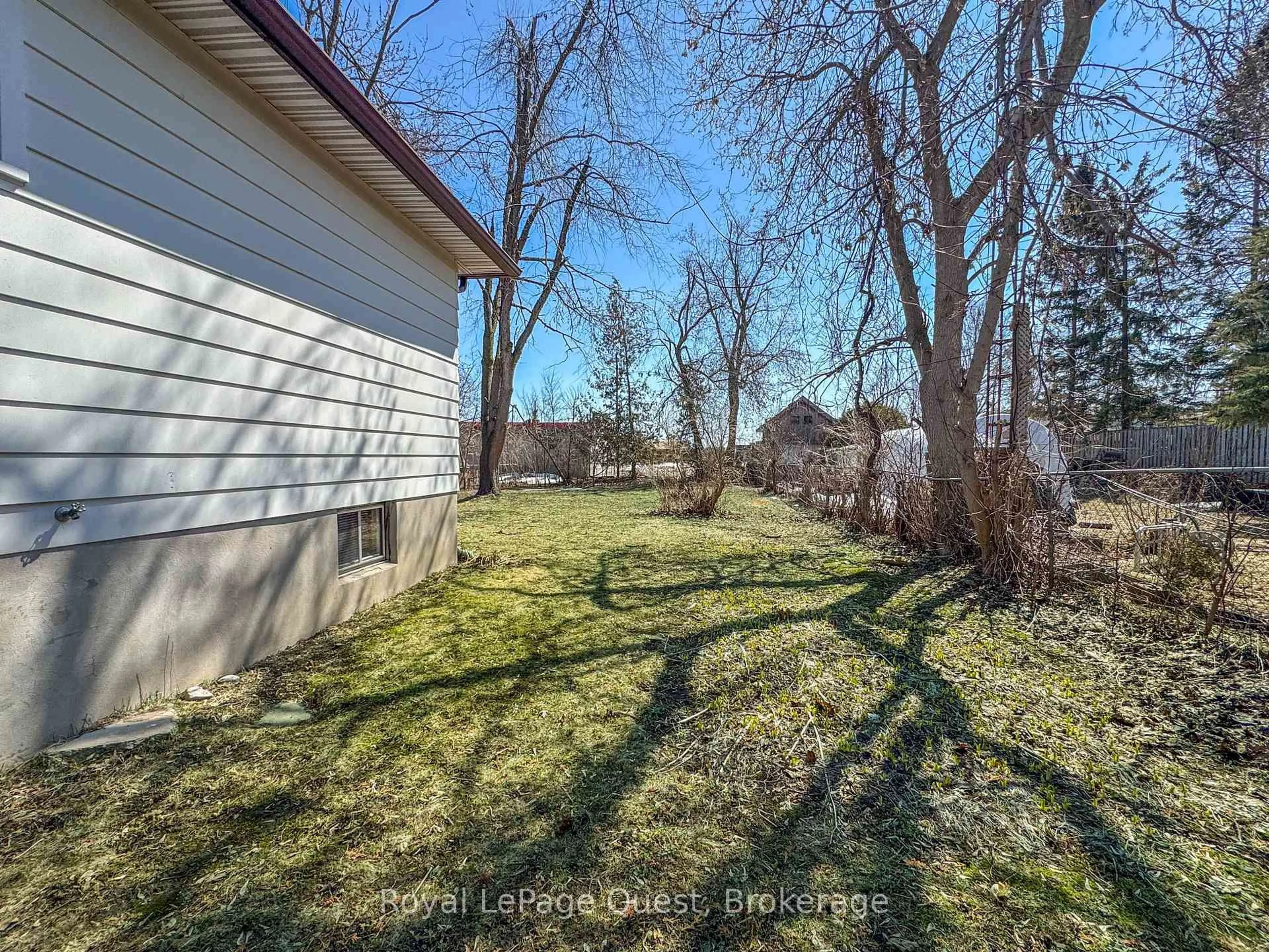 A pic from outside/outdoor area/front of a property/back of a property/a pic from drone, forest/trees view for 17 Rose Ave, Orillia Ontario L3V 2N6