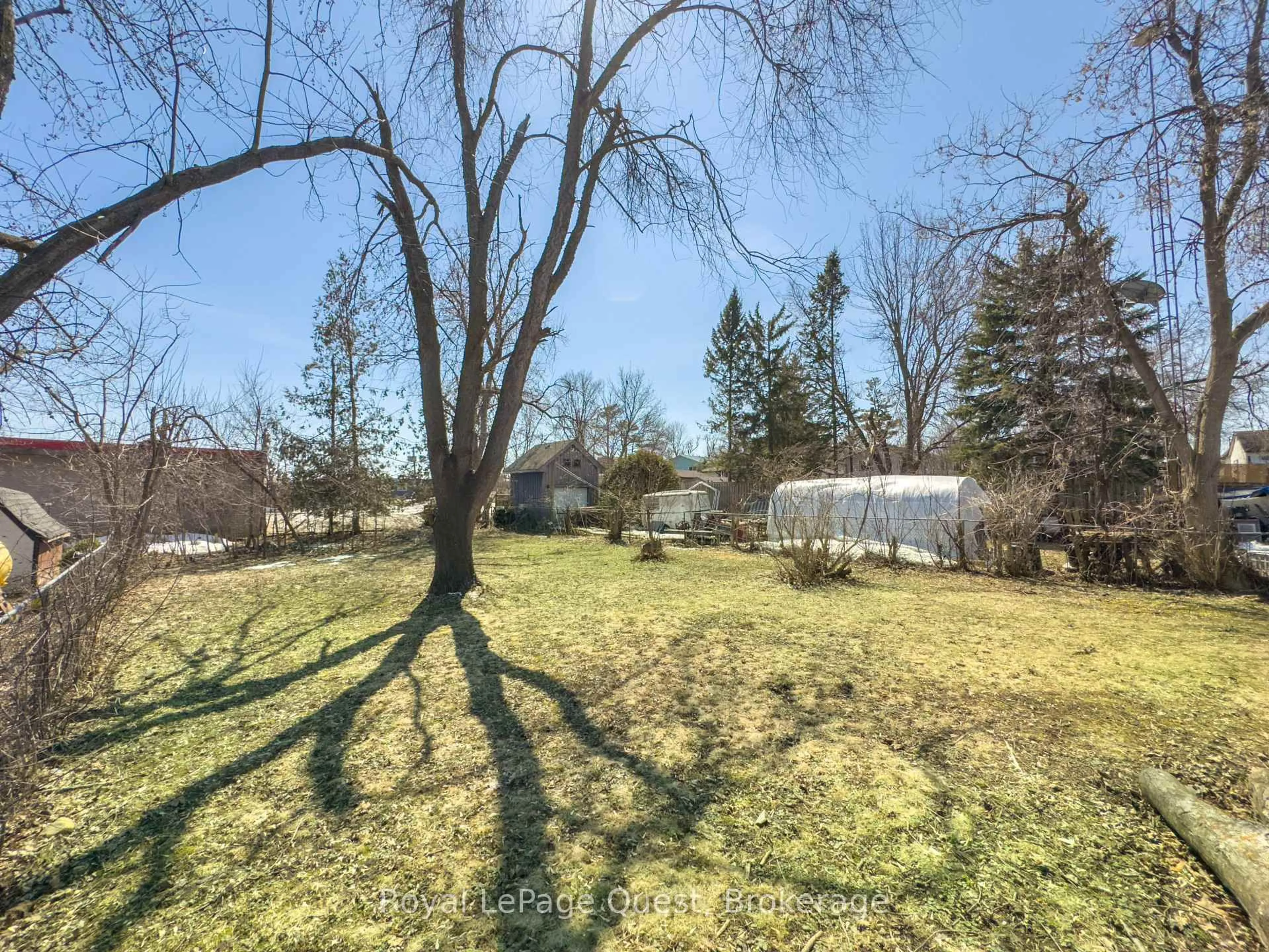 A pic from outside/outdoor area/front of a property/back of a property/a pic from drone, forest/trees view for 17 Rose Ave, Orillia Ontario L3V 2N6