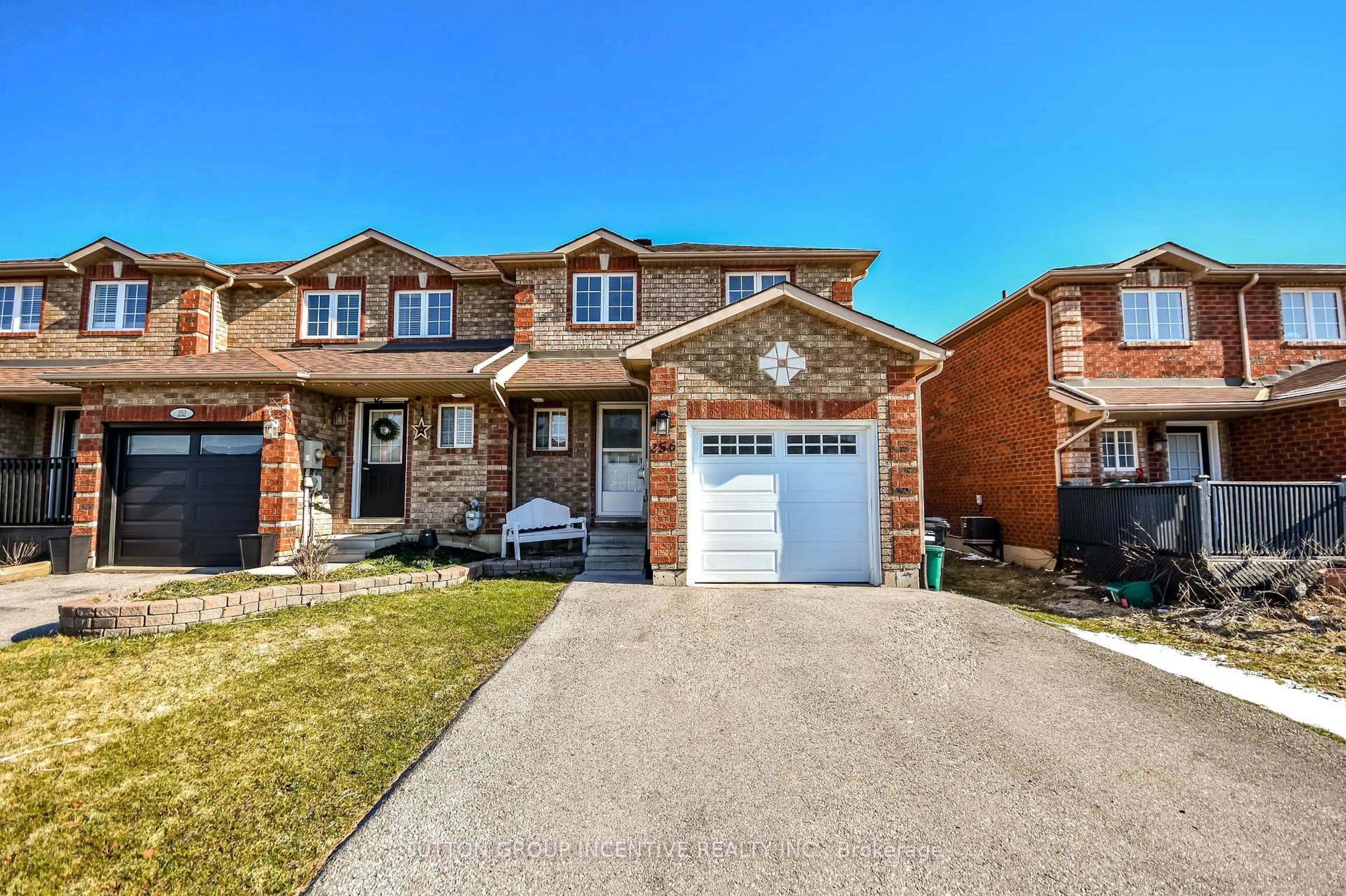 Home with brick exterior material, street for 256 Dunsmore Lane, Barrie Ontario L4M 7A7