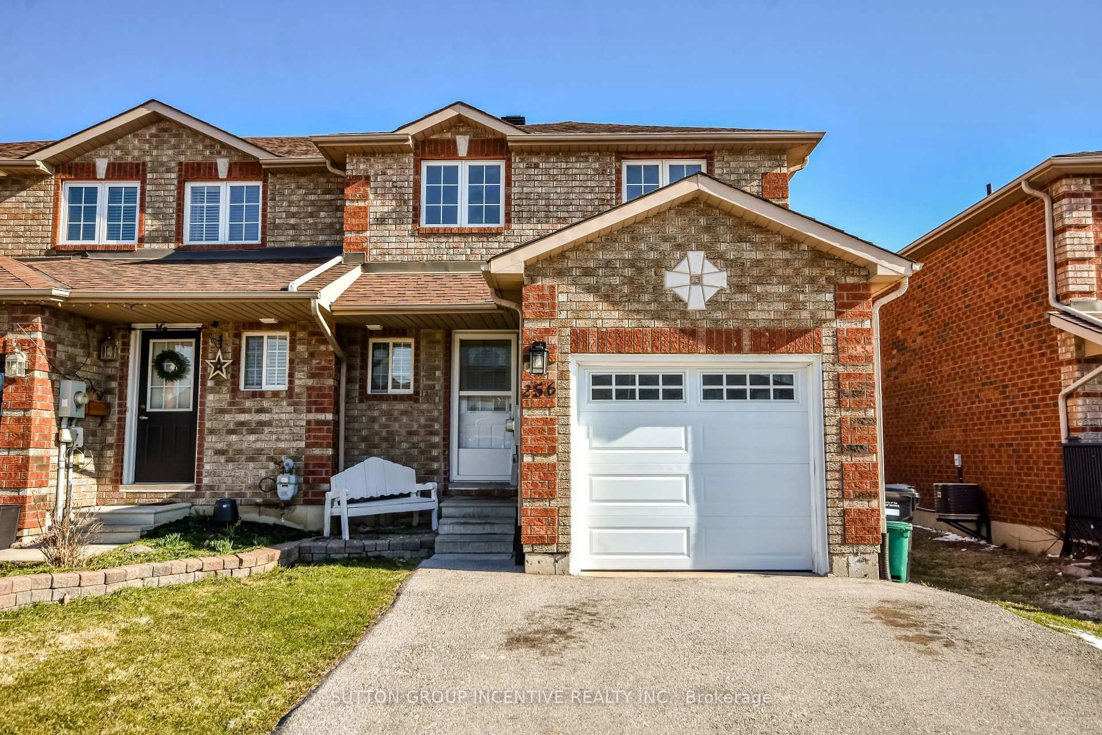 Home with brick exterior material, street for 256 Dunsmore Lane, Barrie Ontario L4M 7A7