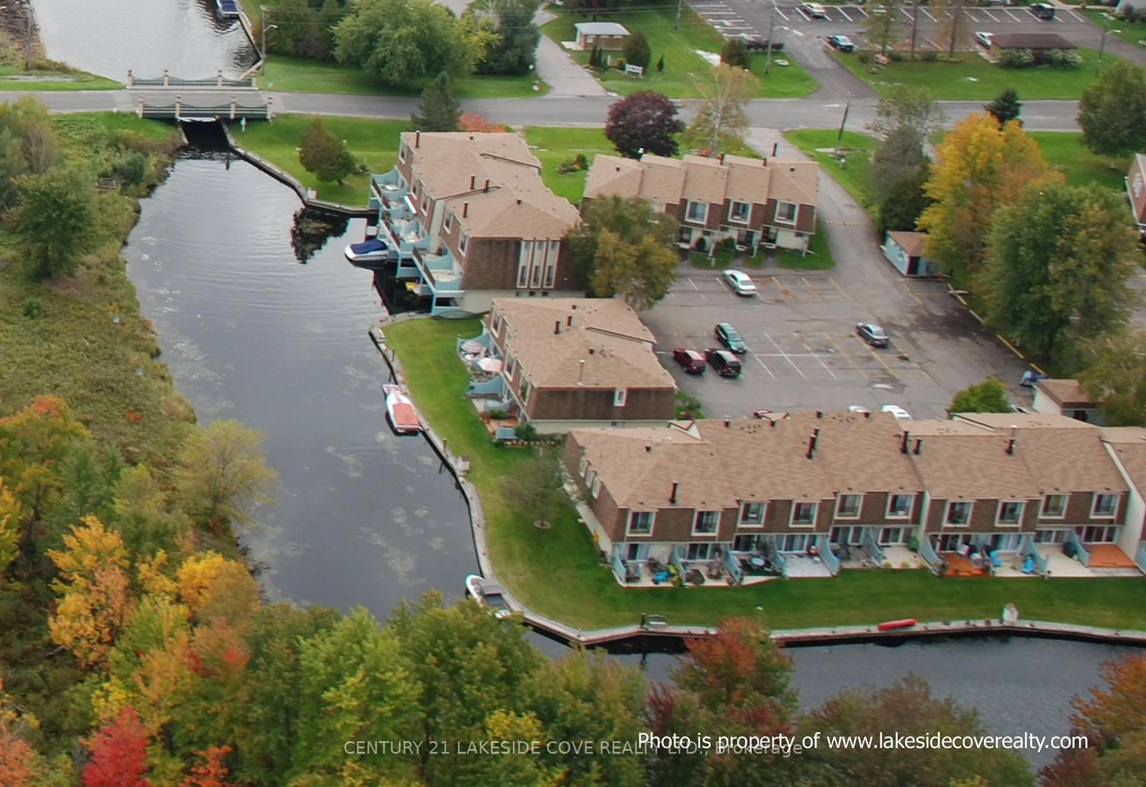 A pic from outside/outdoor area/front of a property/back of a property/a pic from drone, water/lake/river/ocean view for 4 Paradise Blvd #Unit 4, Ramara Ontario L0K 1B0