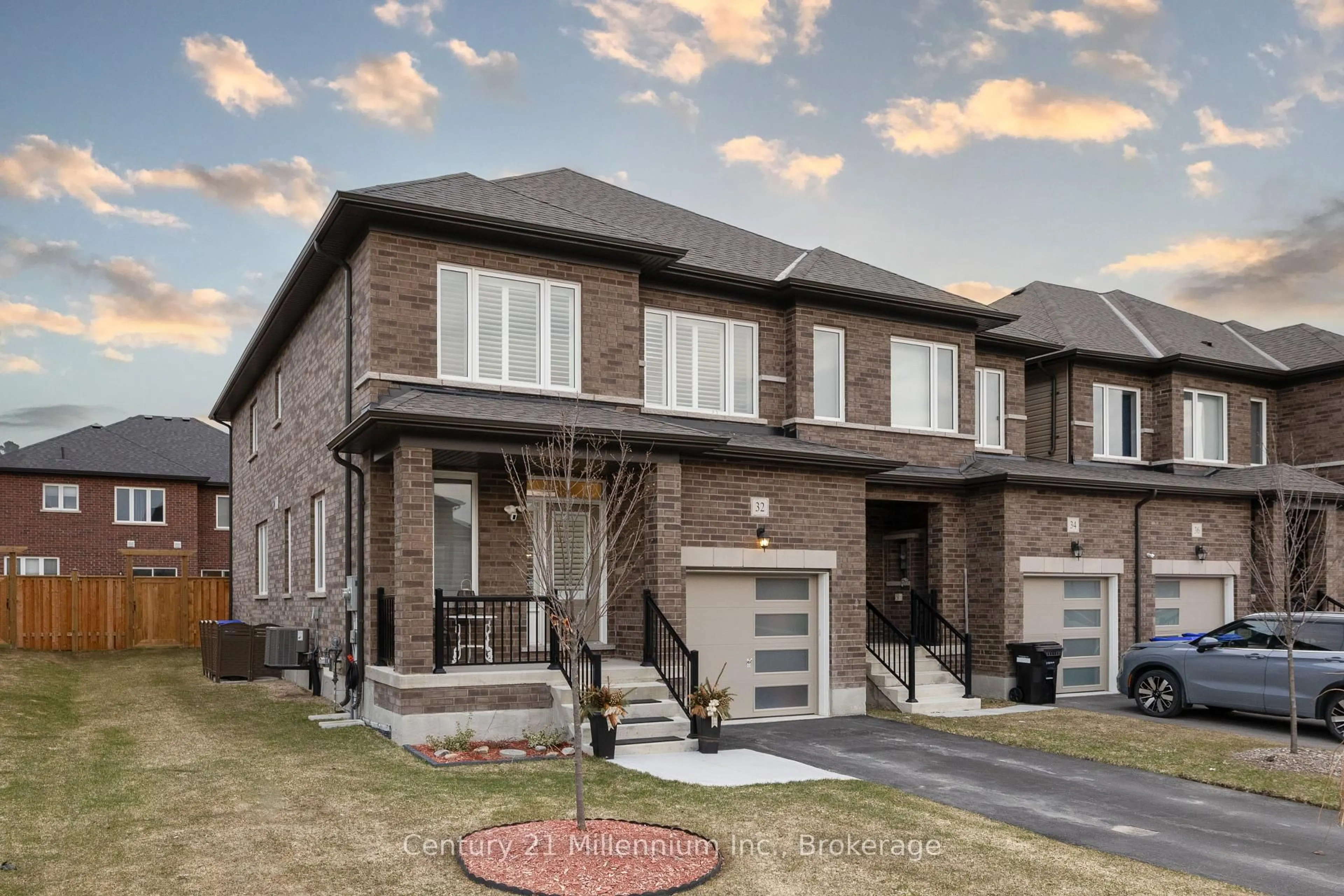 Home with brick exterior material, street for 32 Autumn Dr, Wasaga Beach Ontario L9Z 0K7