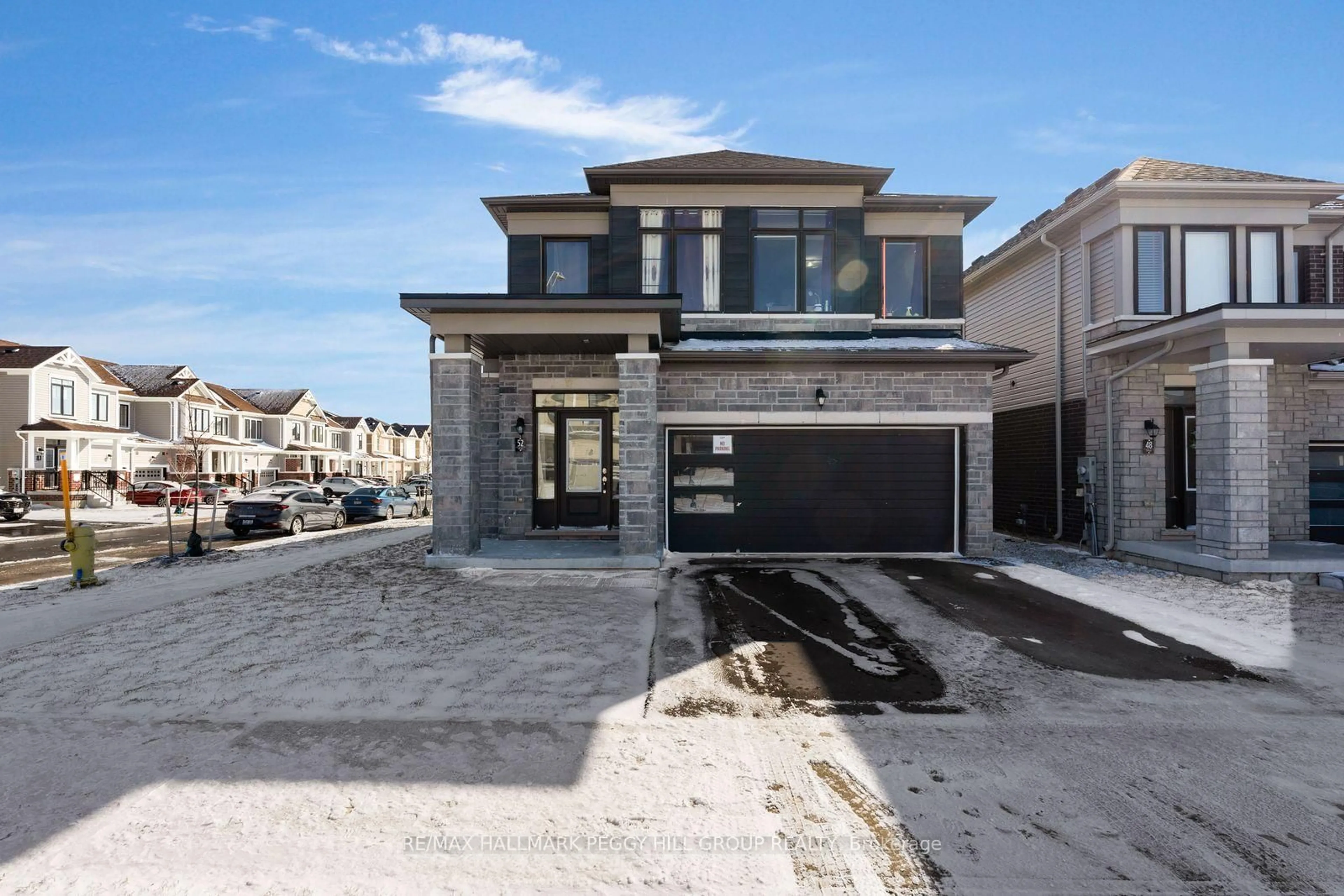 Home with brick exterior material, street for 52 Durham Ave, Barrie Ontario L9J 0W7