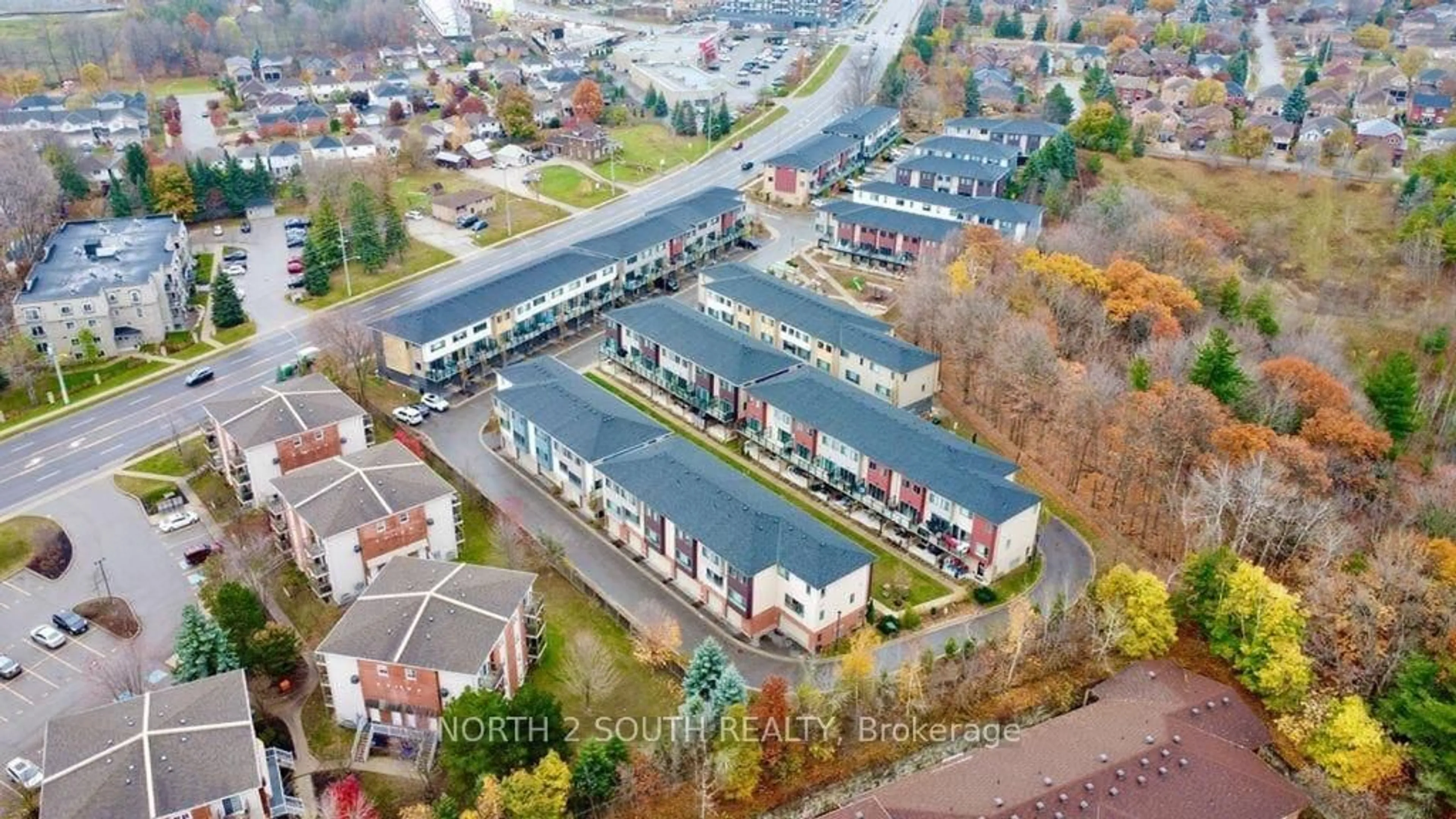 A pic from outside/outdoor area/front of a property/back of a property/a pic from drone, unknown for 369 Essa Rd #48, Barrie Ontario L4N 9C8