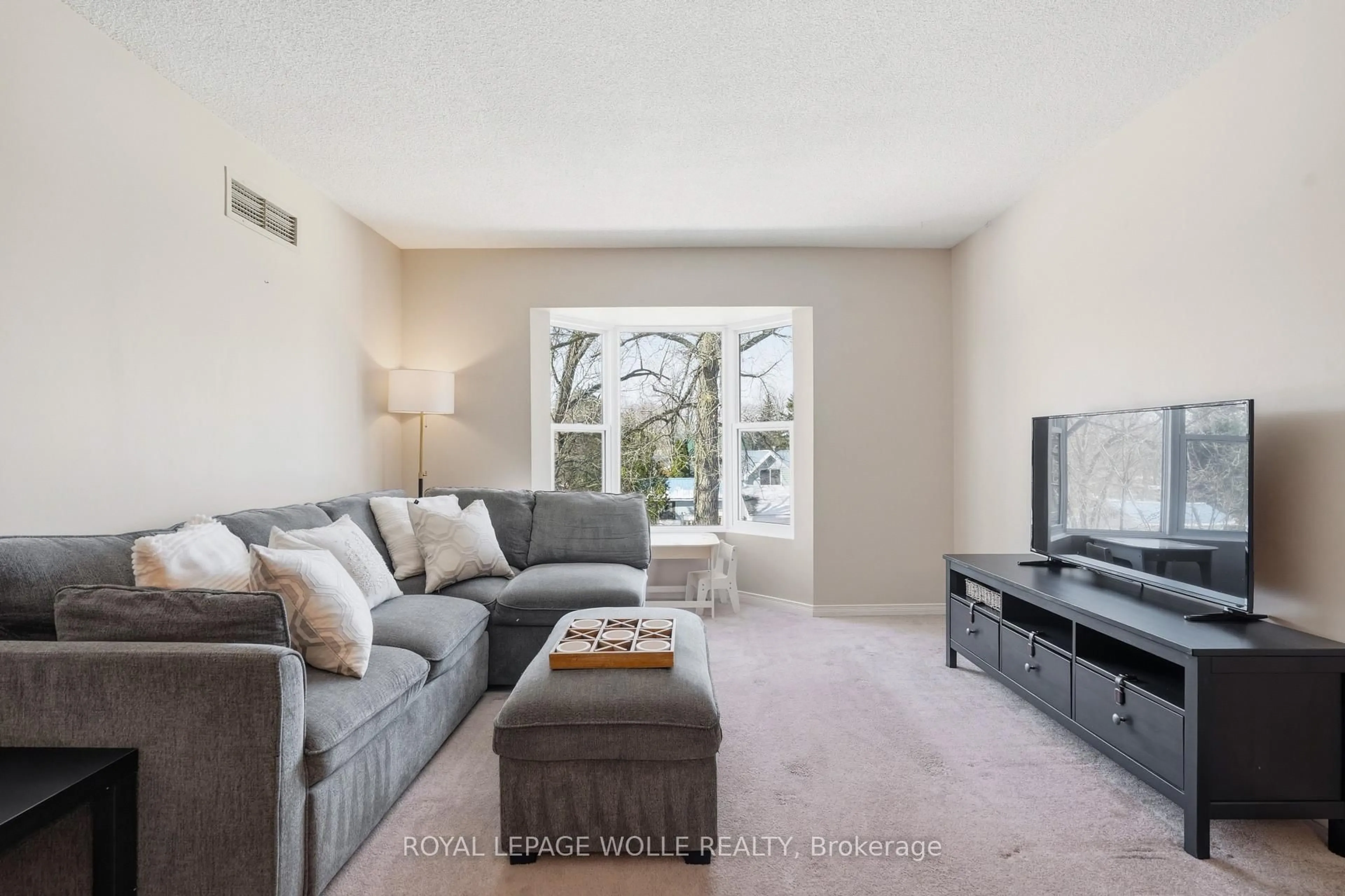 Living room with furniture, unknown for 107 Bond St #304, Orillia Ontario L3V 1J7