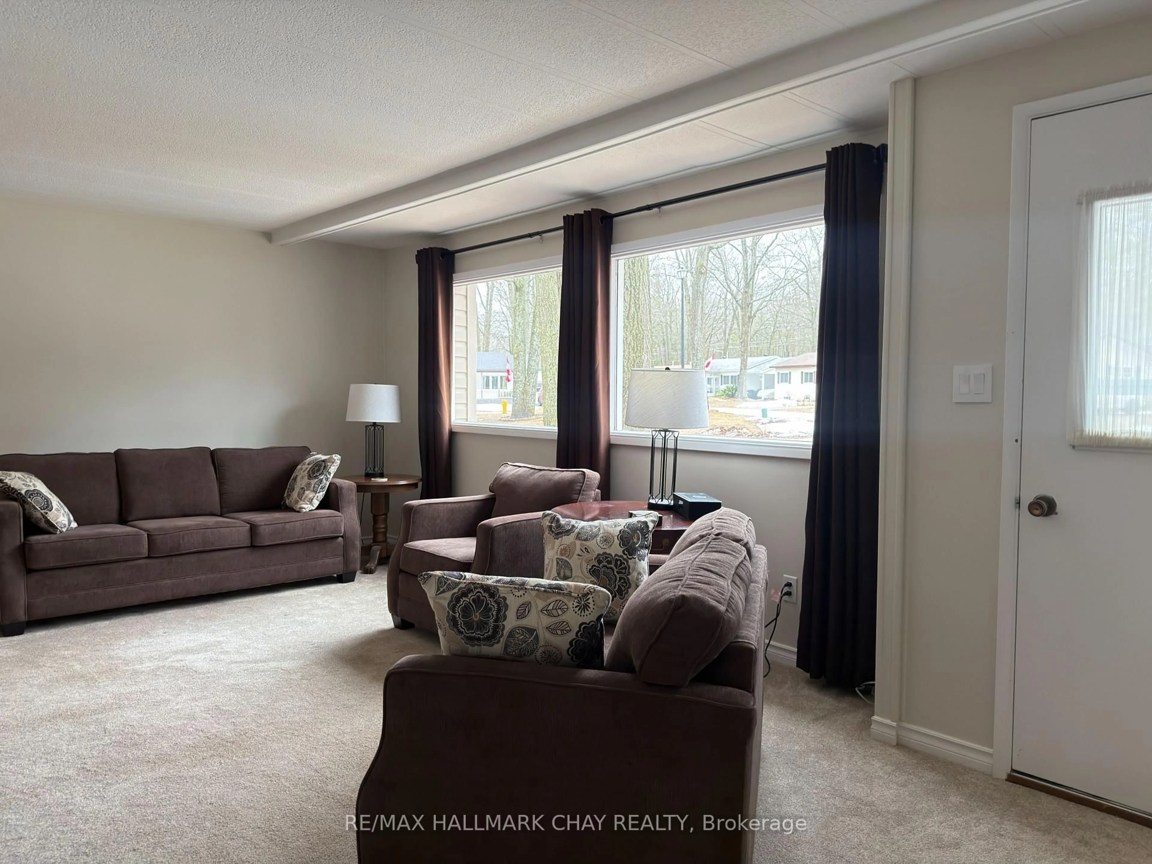 Living room with furniture, unknown for 13 Carruthers St, Wasaga Beach Ontario L9Z 1K2