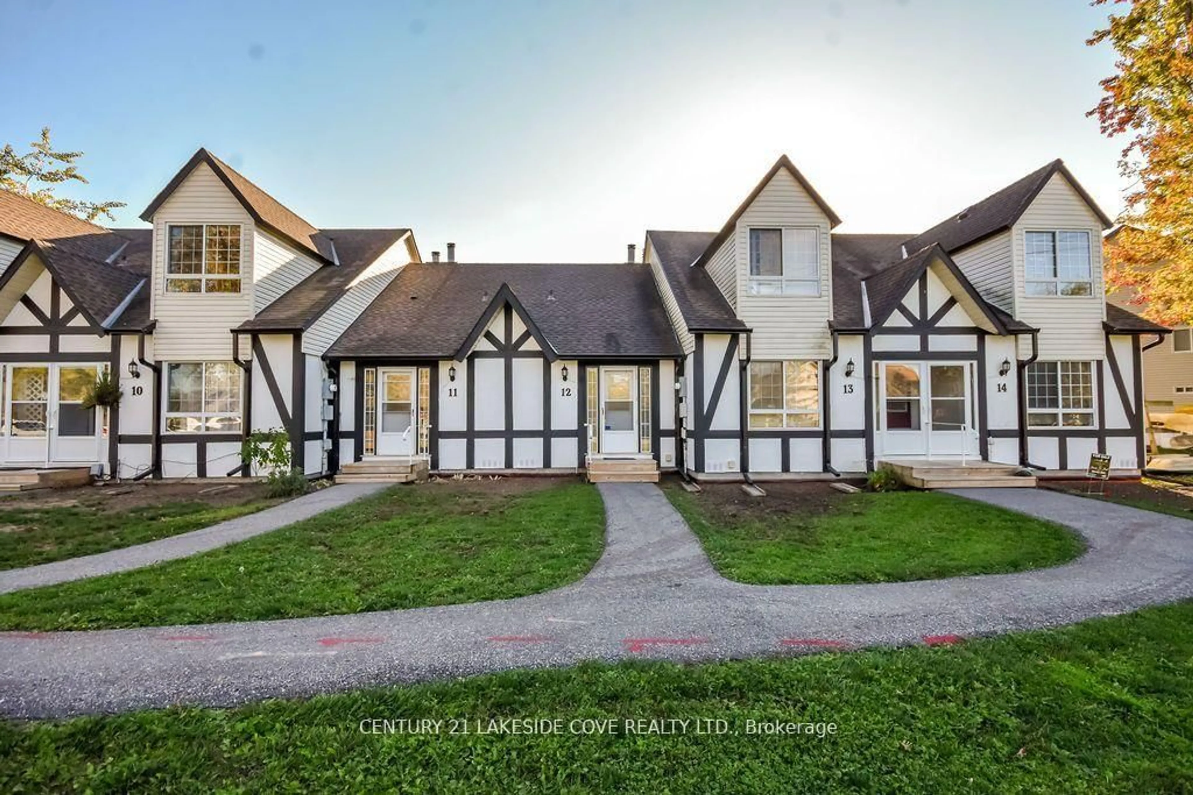 A pic from outside/outdoor area/front of a property/back of a property/a pic from drone, street for 81 Laguna Pkwy #Unit 12, Ramara Ontario L0K 1B0