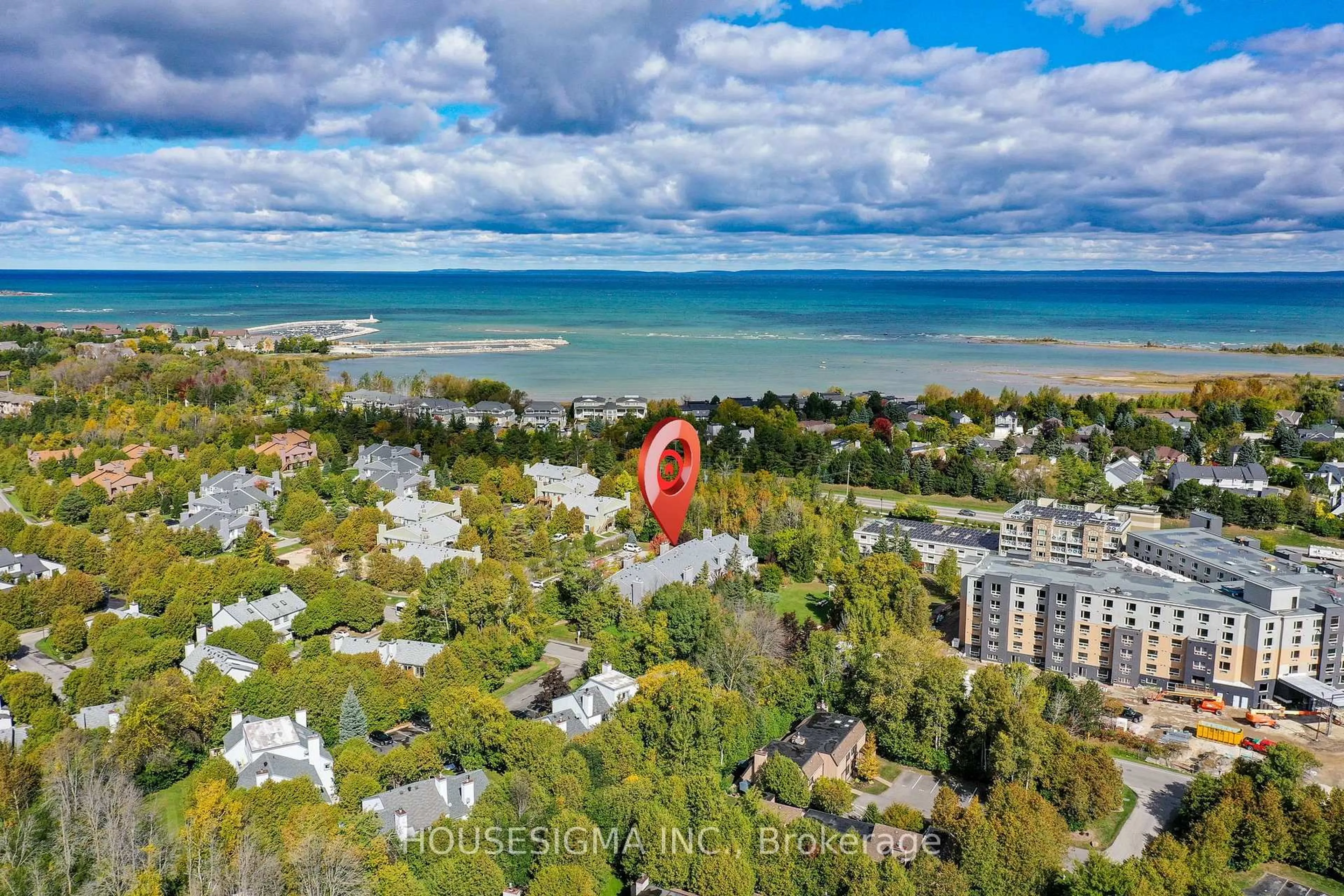 A pic from outside/outdoor area/front of a property/back of a property/a pic from drone, water/lake/river/ocean view for 11 Dawson Dr #718, Collingwood Ontario L9Y 5B4