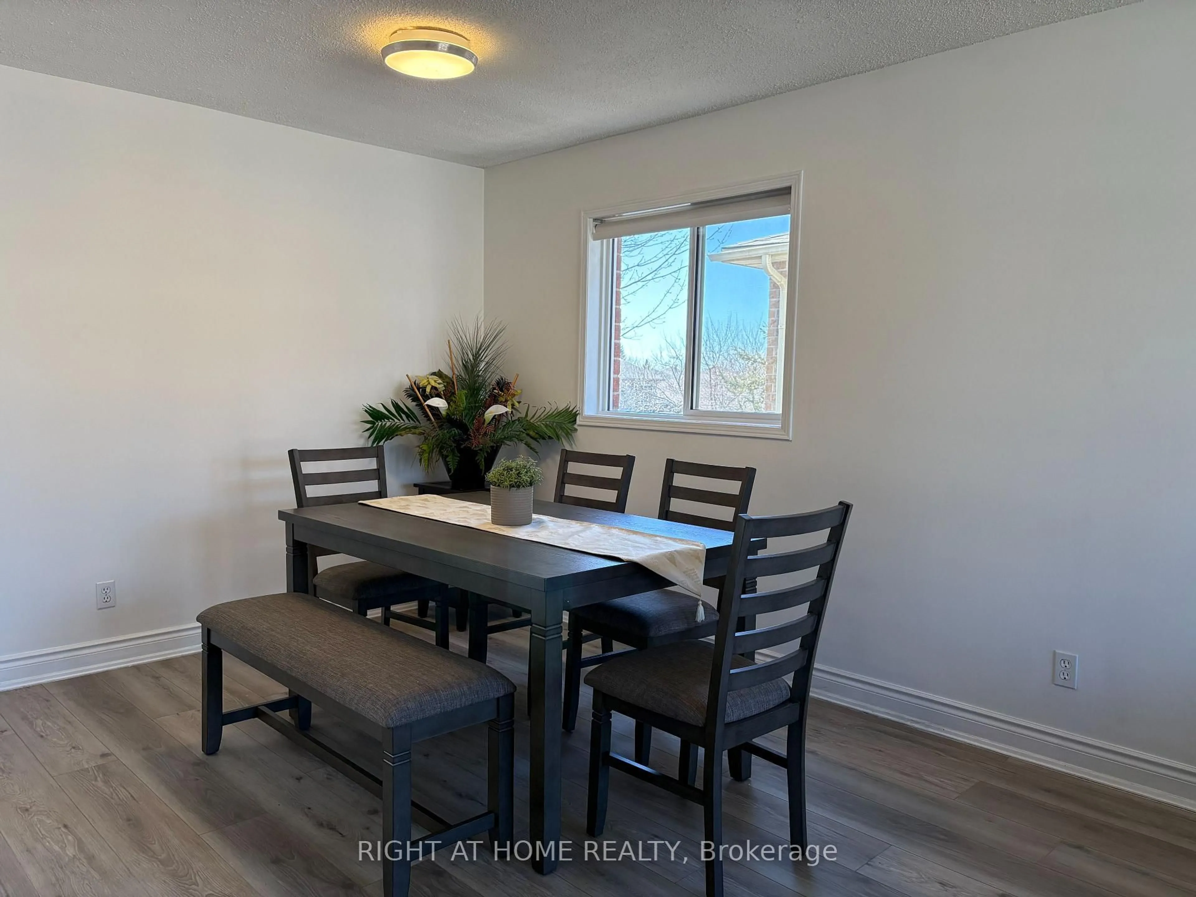 Dining room, wood/laminate floor for 13 Golds Cres, Barrie Ontario L4N 8R5
