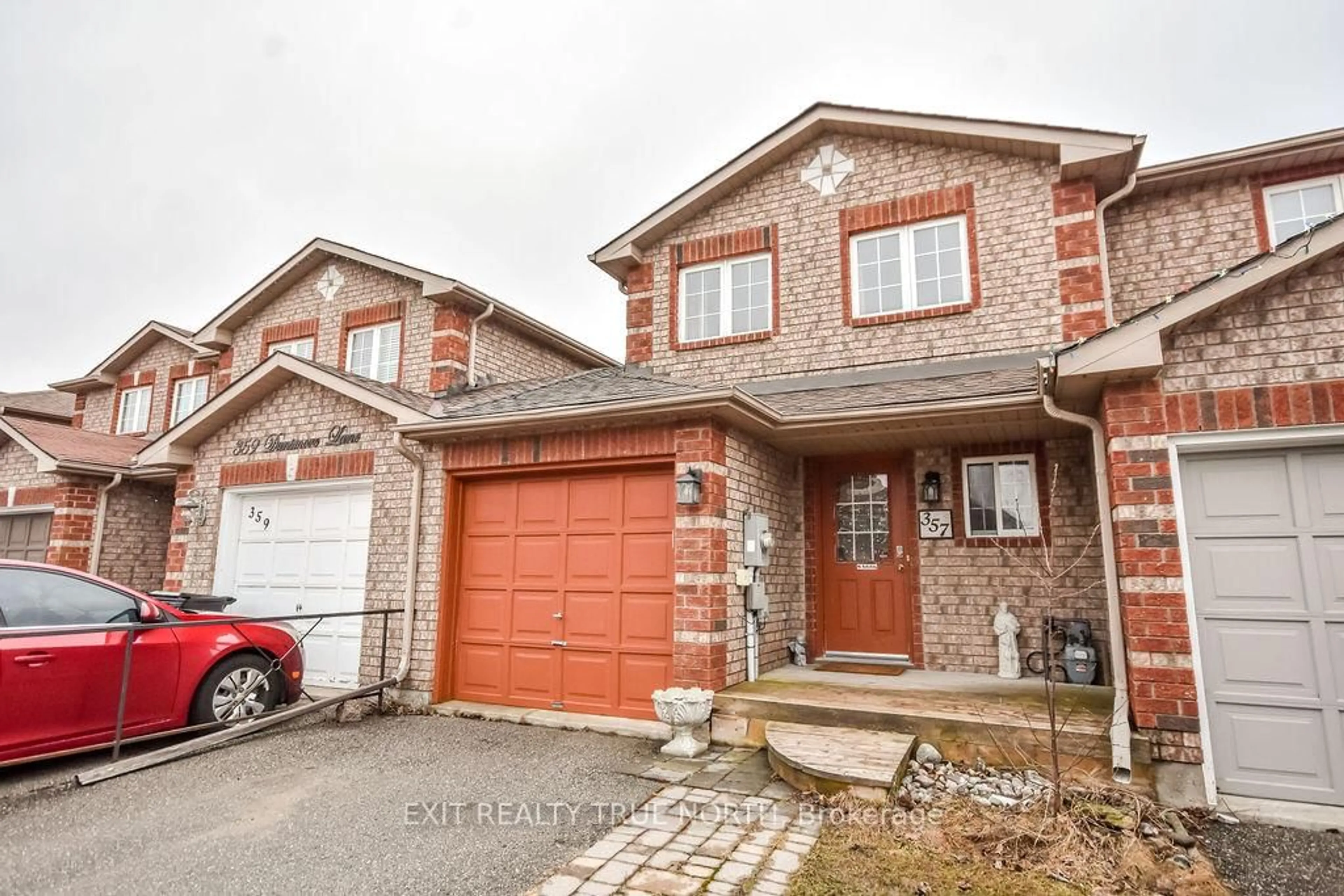 Home with brick exterior material, street for 357 Dunsmore Lane, Barrie Ontario L4M 7B1