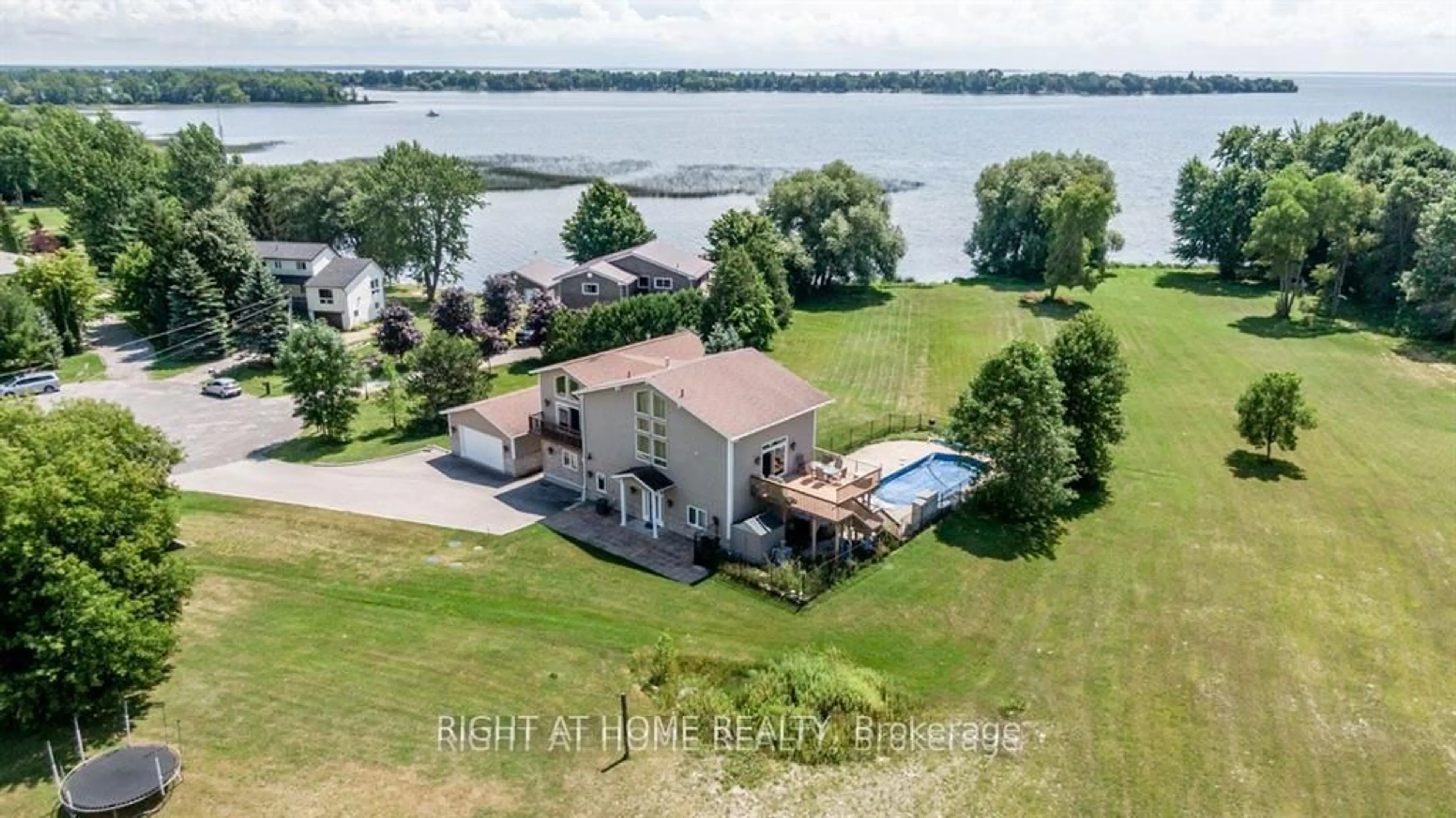 A pic from outside/outdoor area/front of a property/back of a property/a pic from drone, water/lake/river/ocean view for 3788 Tuppy Dr, Ramara Ontario L3V 0L1