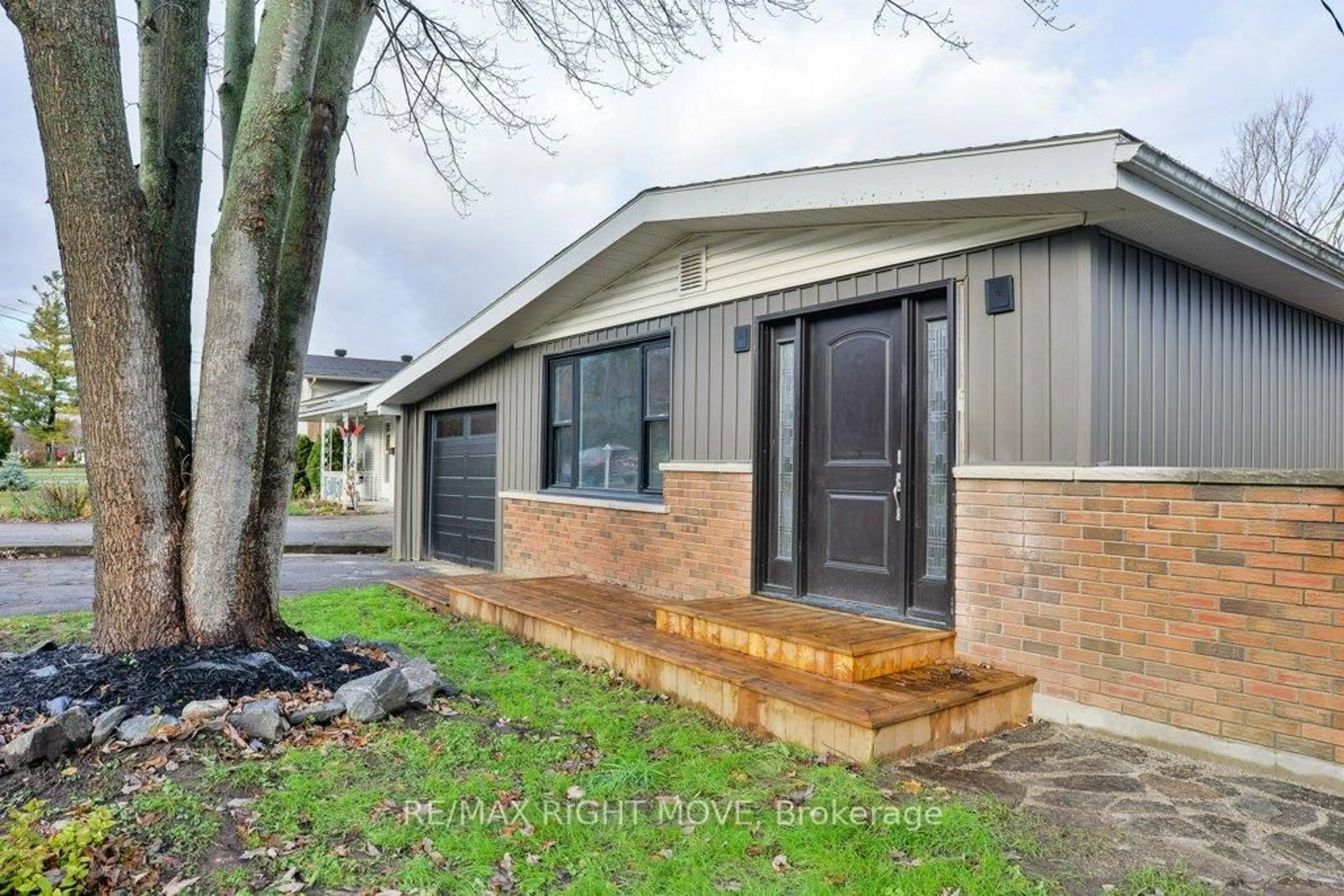 Home with brick exterior material, street for 406 Sundial Dr, Orillia Ontario L3V 4A6