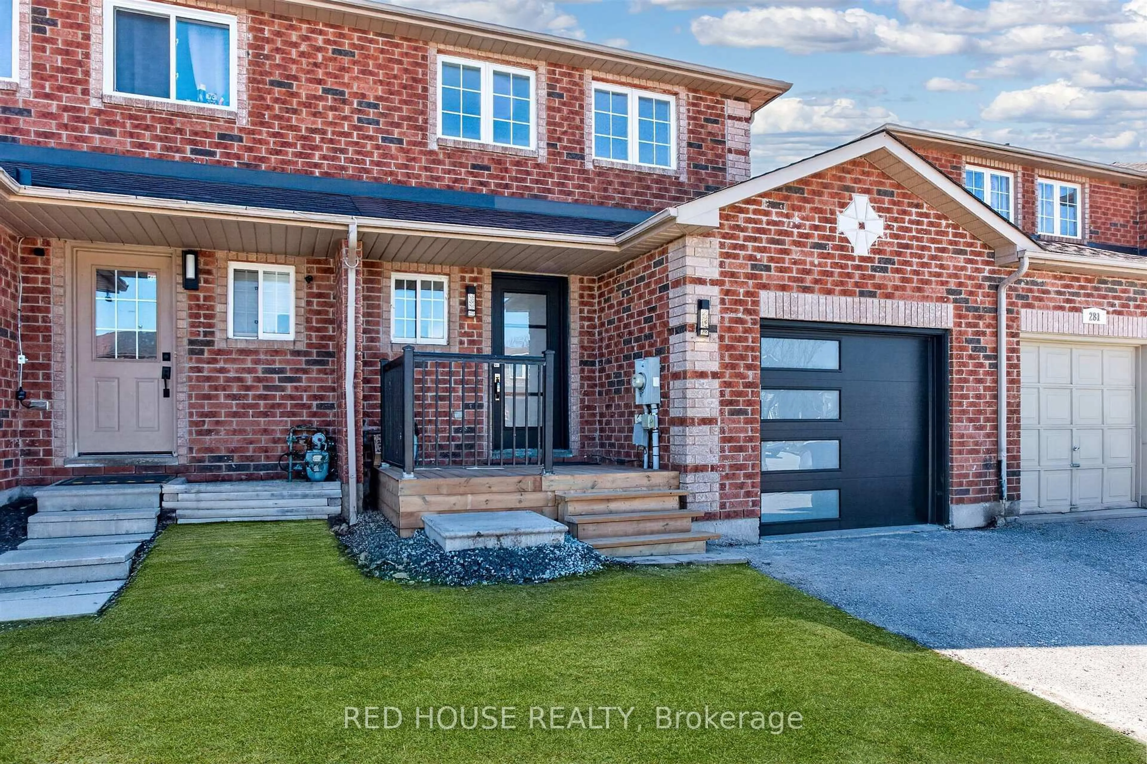 Home with brick exterior material, street for 283 Dunsmore Lane, Barrie Ontario L4M 7A7