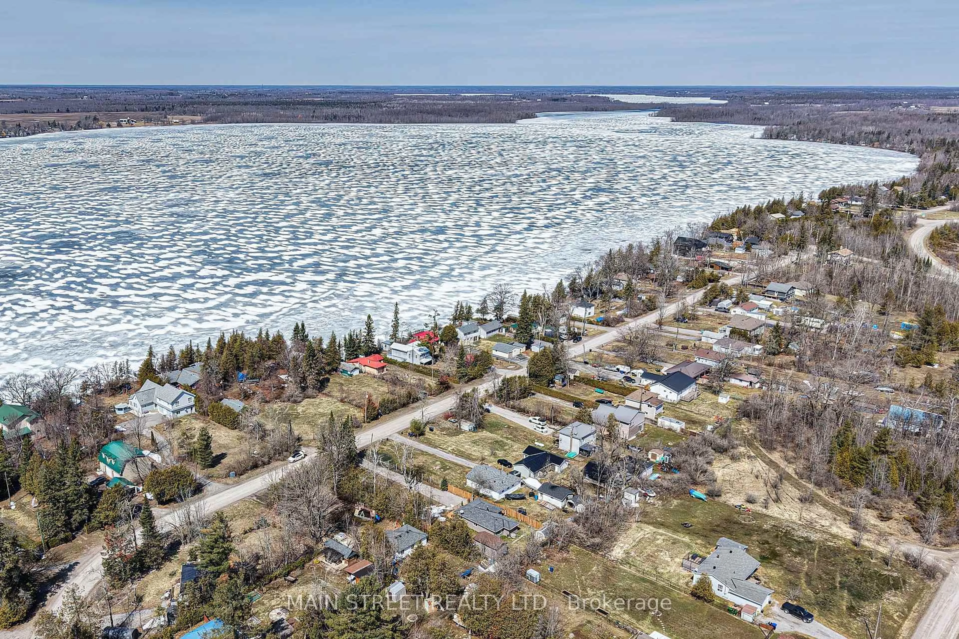 A pic from outside/outdoor area/front of a property/back of a property/a pic from drone, water/lake/river/ocean view for 1079 Sylvan  Glen Dr, Ramara Ontario L0K 1B0