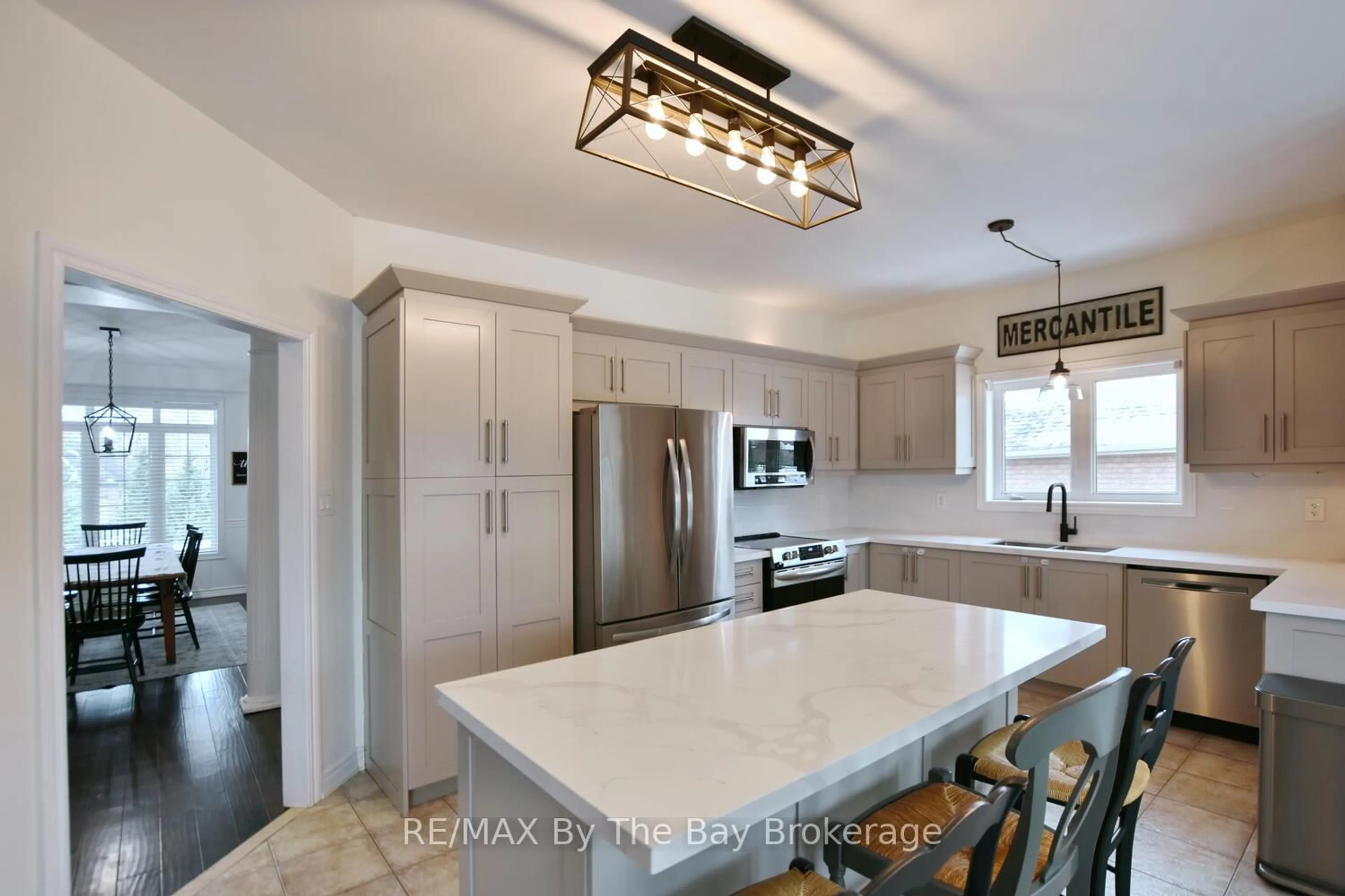 Open concept kitchen, ceramic/tile floor for 17 Basswood Dr, Wasaga Beach Ontario L9Z 0A8