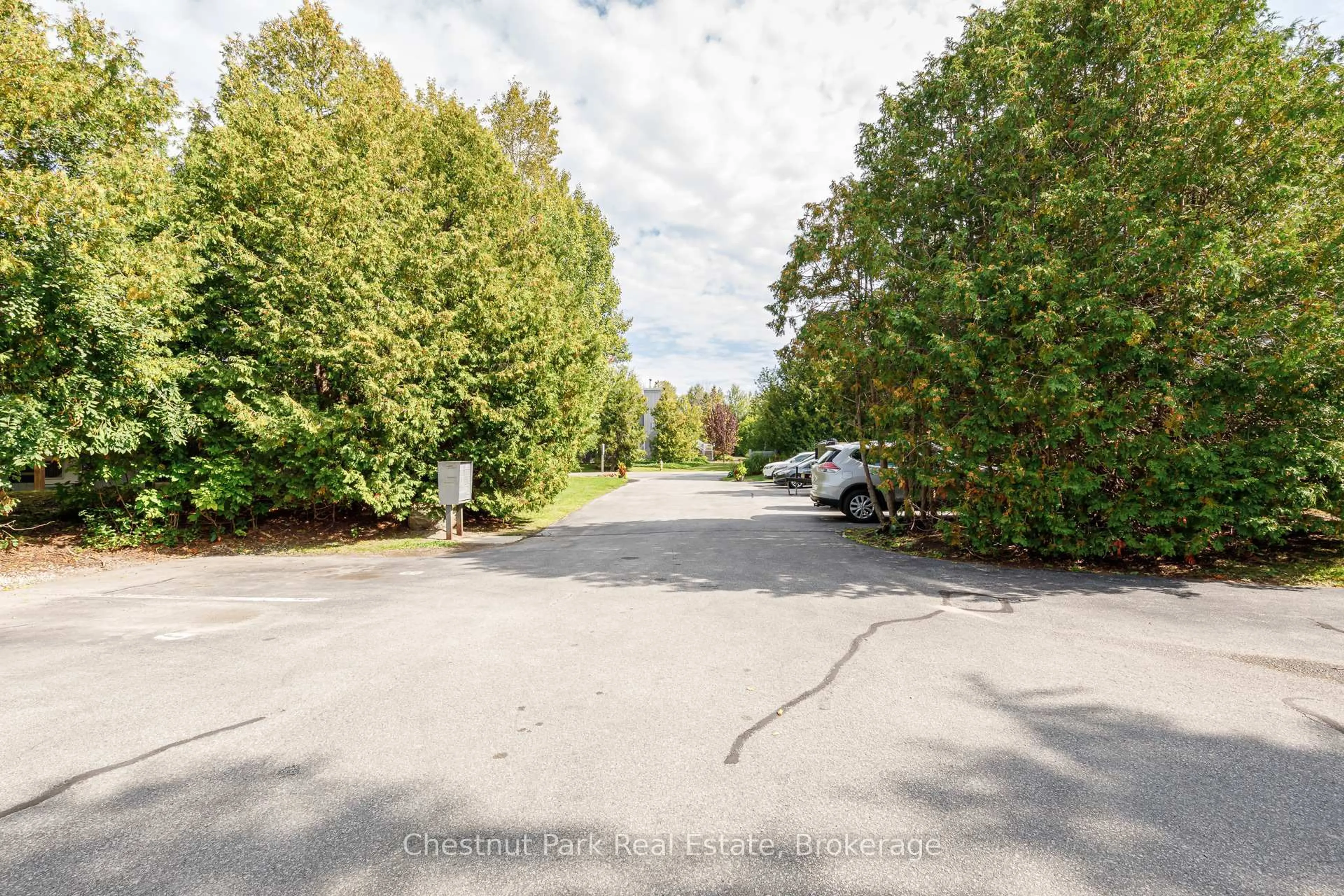 A pic from outside/outdoor area/front of a property/back of a property/a pic from drone, unknown for 12 Dawson Dr #407, Collingwood Ontario L9Y 5B4