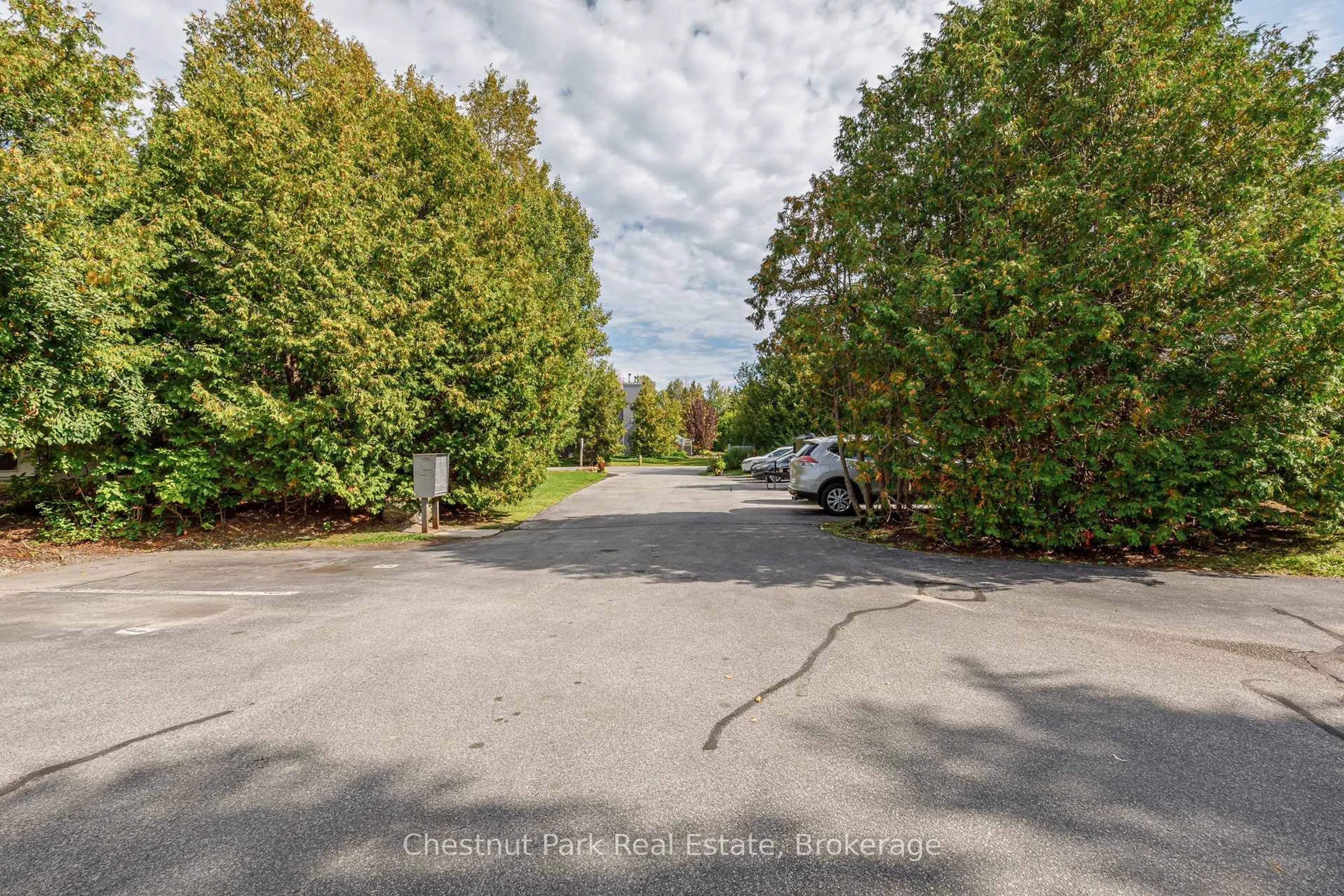 A pic from outside/outdoor area/front of a property/back of a property/a pic from drone, unknown for 12 Dawson Dr #407, Collingwood Ontario L9Y 5B4