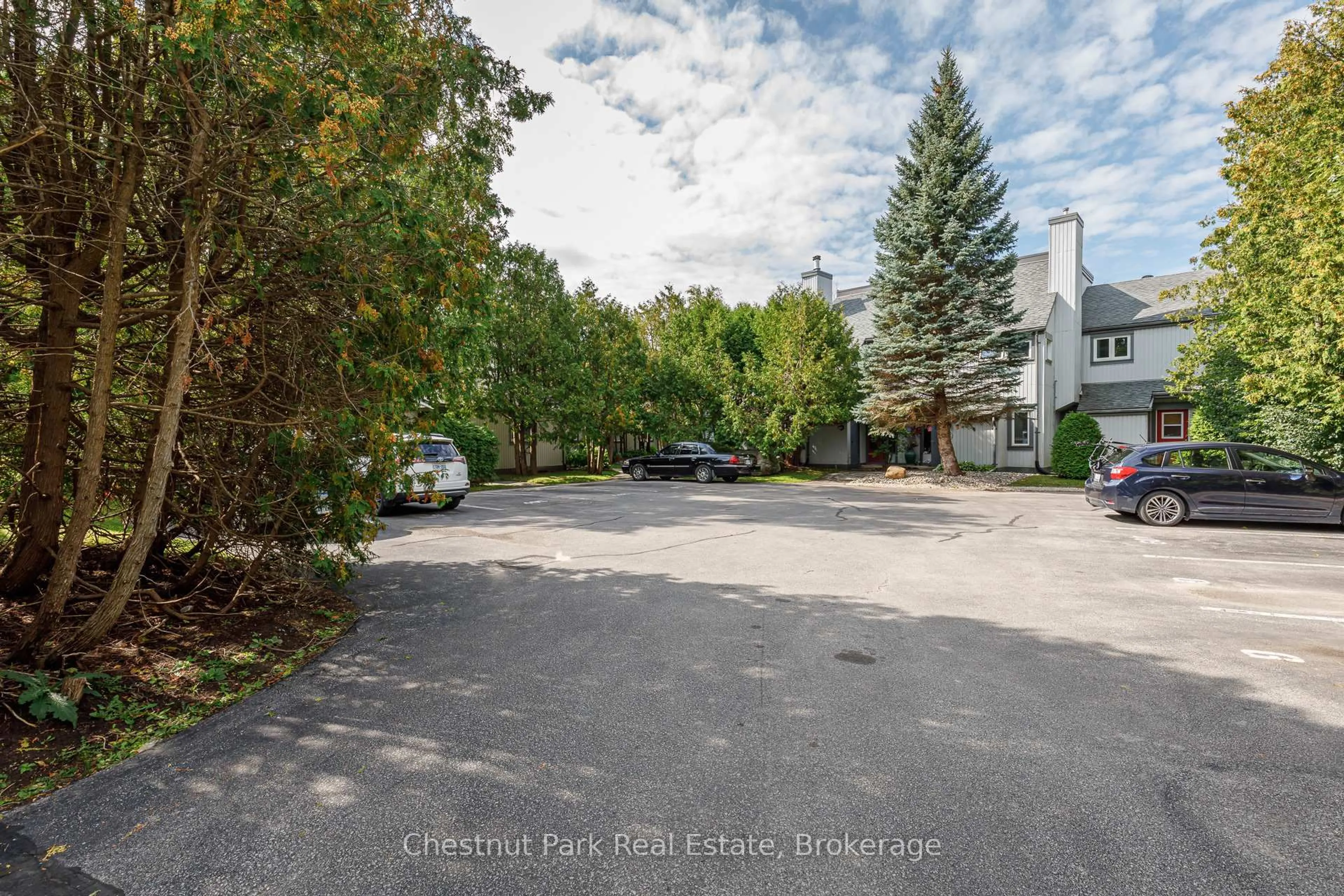 A pic from outside/outdoor area/front of a property/back of a property/a pic from drone, street for 12 Dawson Dr #407, Collingwood Ontario L9Y 5B4