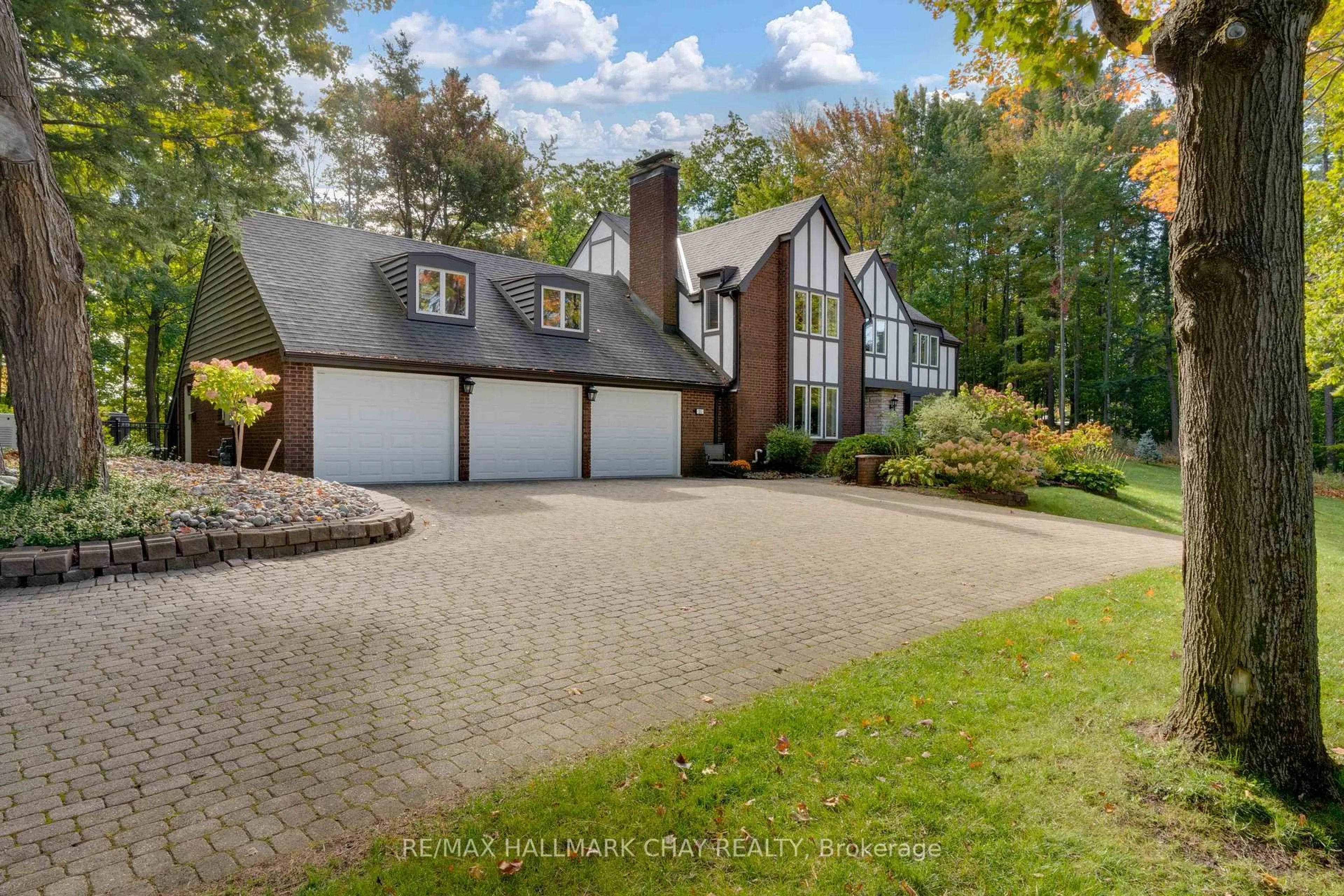 Home with brick exterior material, street for 11 Park Tr, Springwater Ontario L9X 0L3