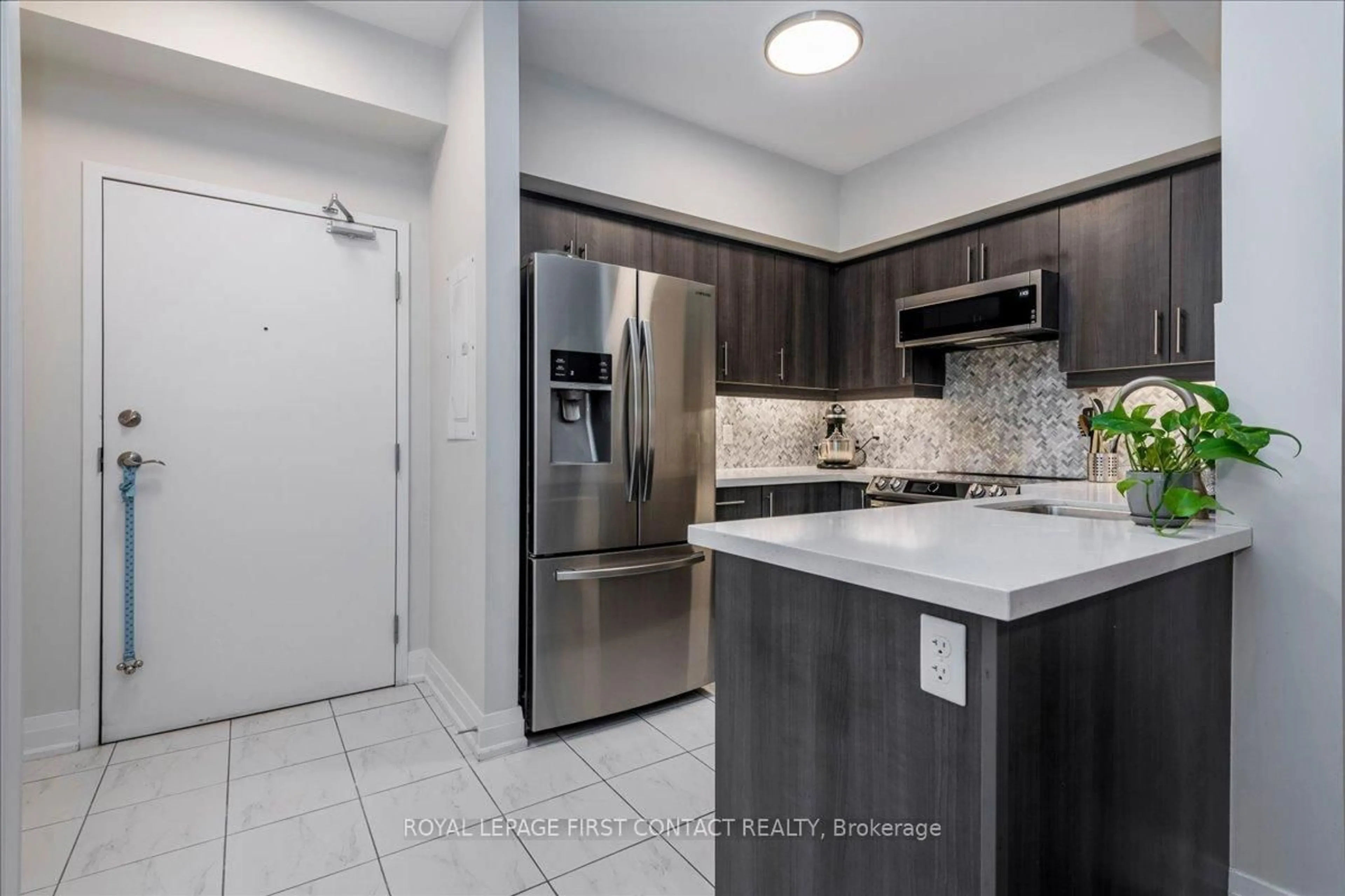 Standard kitchen, ceramic/tile floor for 300 Essa Rd #407, Barrie Ontario L9J 0B9