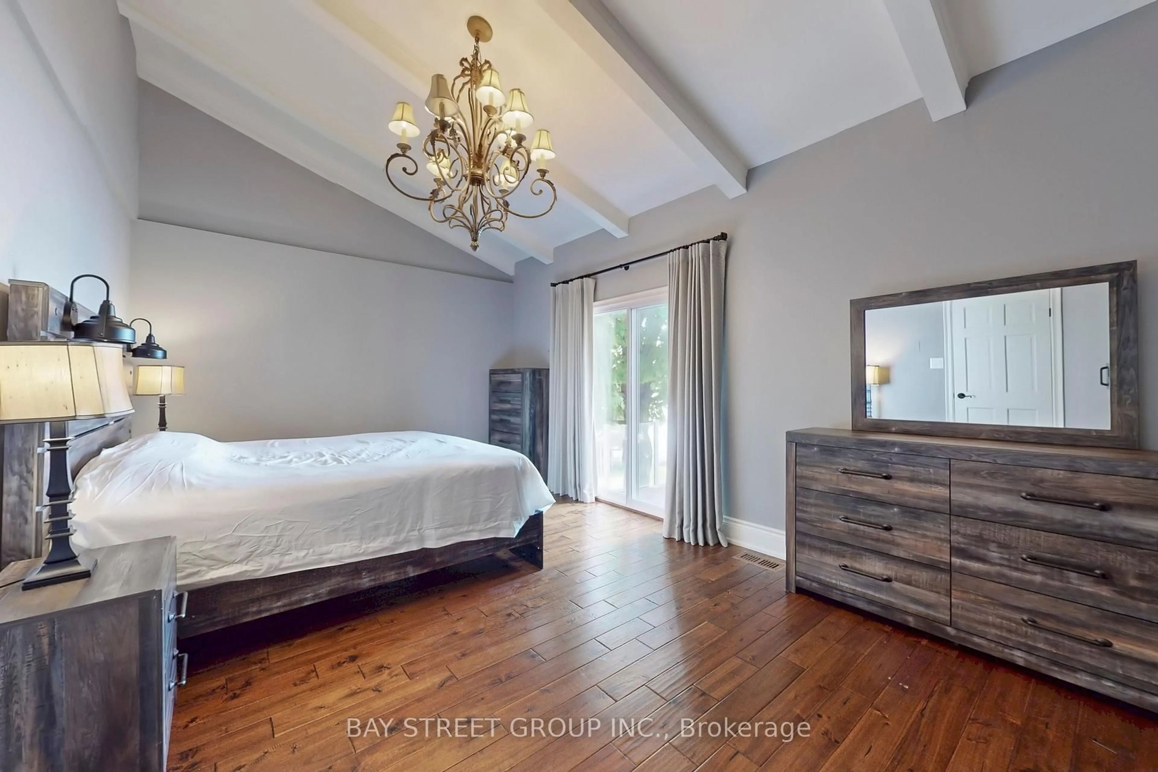 Bedroom with bed, wood/laminate floor for 3784 Tuppy Dr, Ramara Ontario L3V 6H7