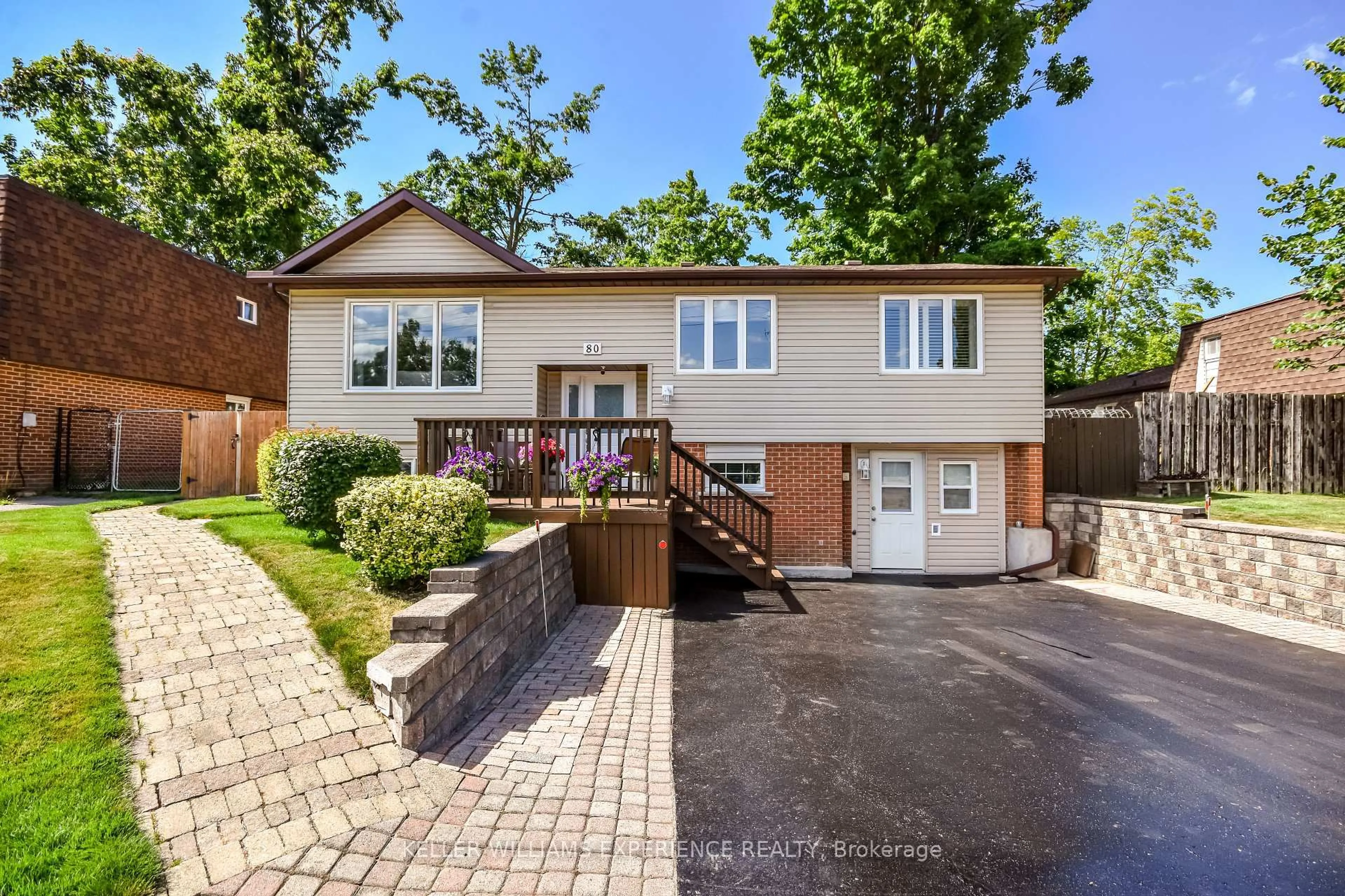 Home with brick exterior material, street for 80 Cundles Rd, Barrie Ontario L4M 2Z7