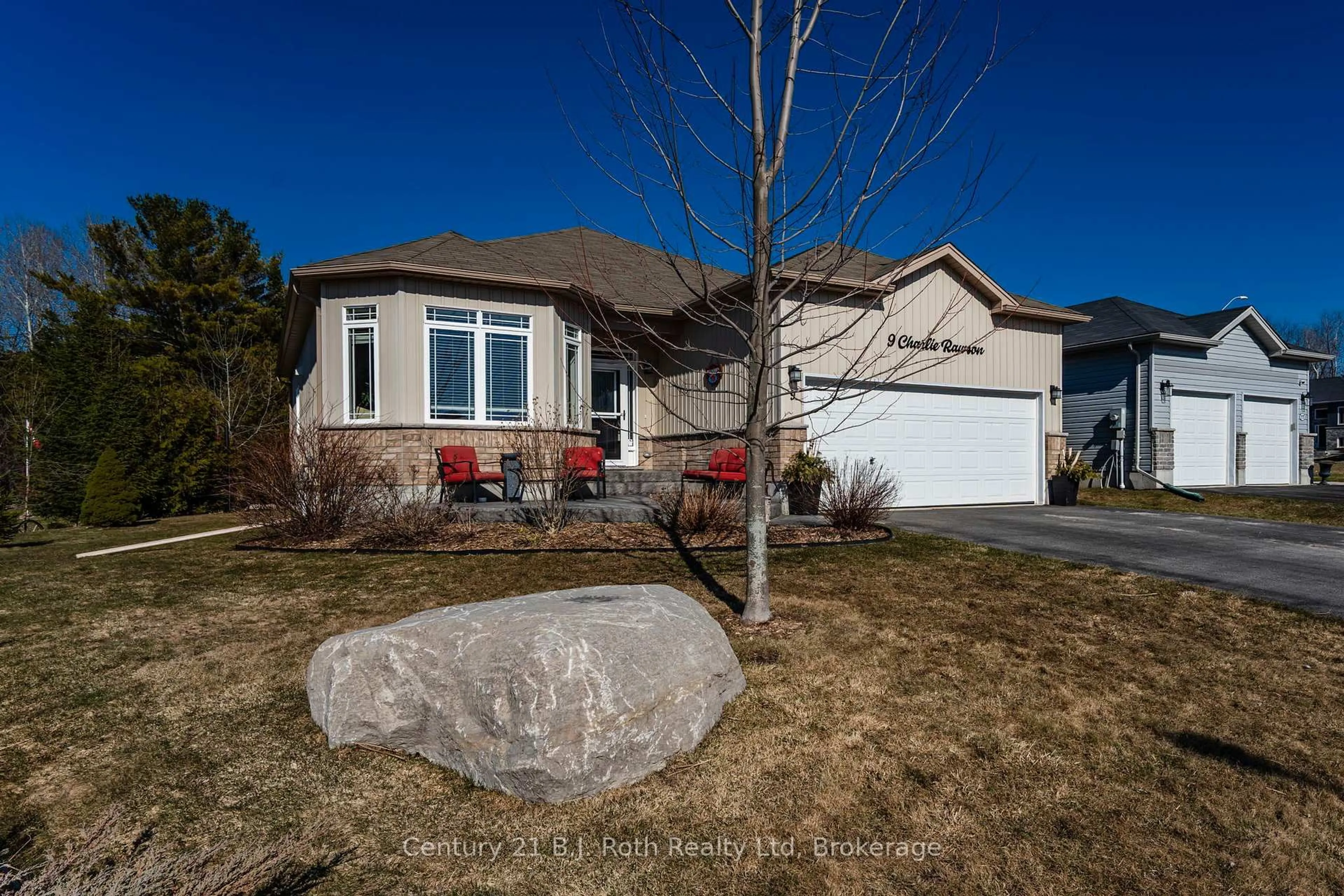 Home with vinyl exterior material, street for 9 Charlie Rawson Blvd, Tay Ontario L0K 2A0