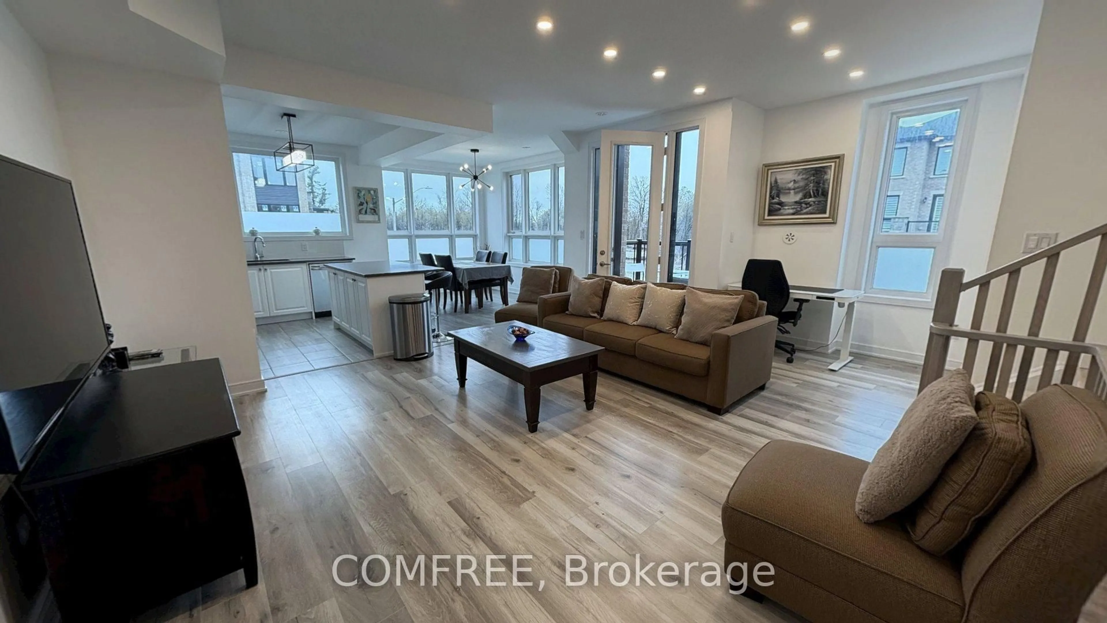 Open concept kitchen, wood/laminate floor for 1 Red Maple Lane, Barrie Ontario L9J 0N4