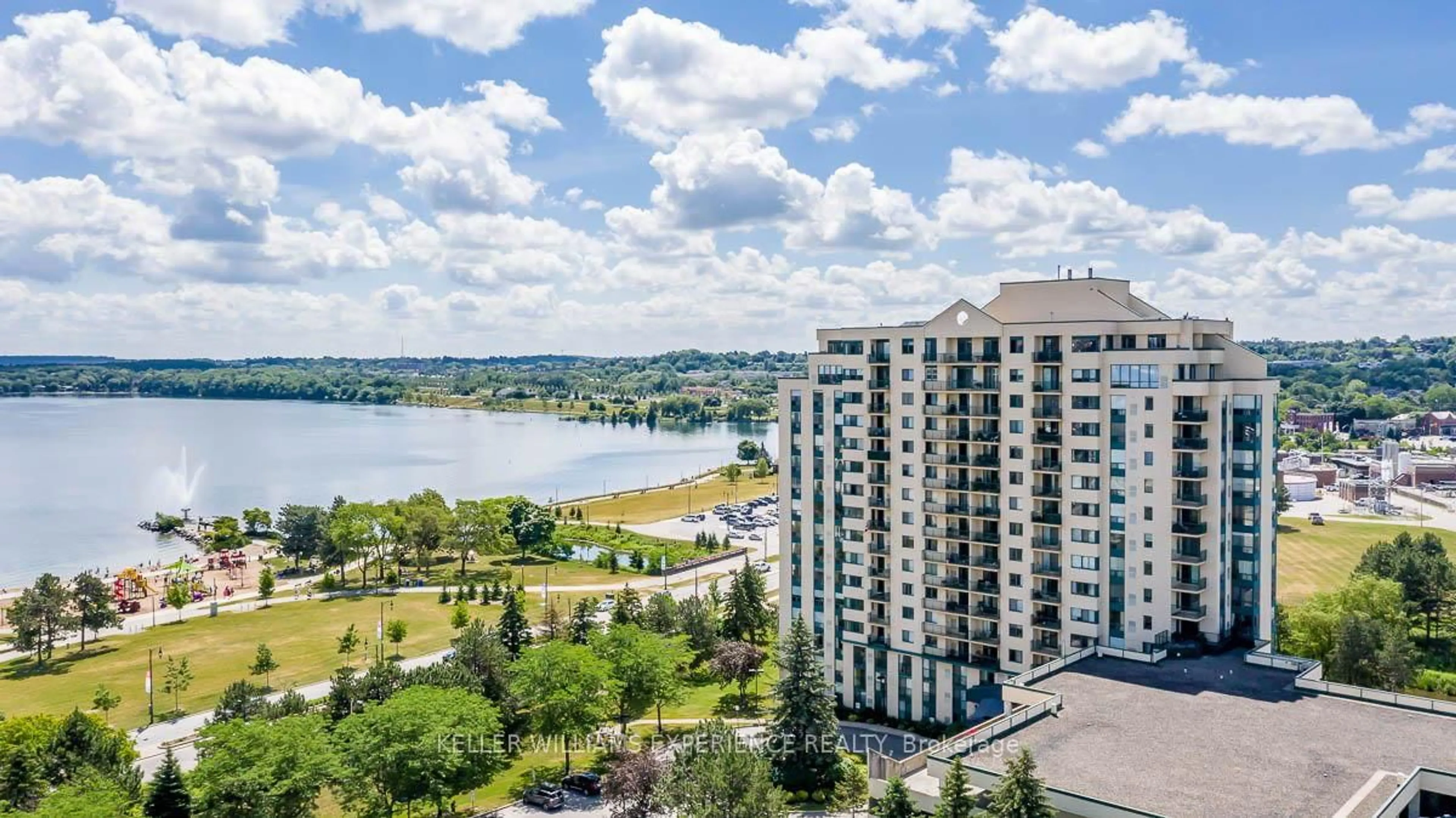 A pic from outside/outdoor area/front of a property/back of a property/a pic from drone, water/lake/river/ocean view for 75 Ellen St #104, Barrie Ontario L4N 7R6