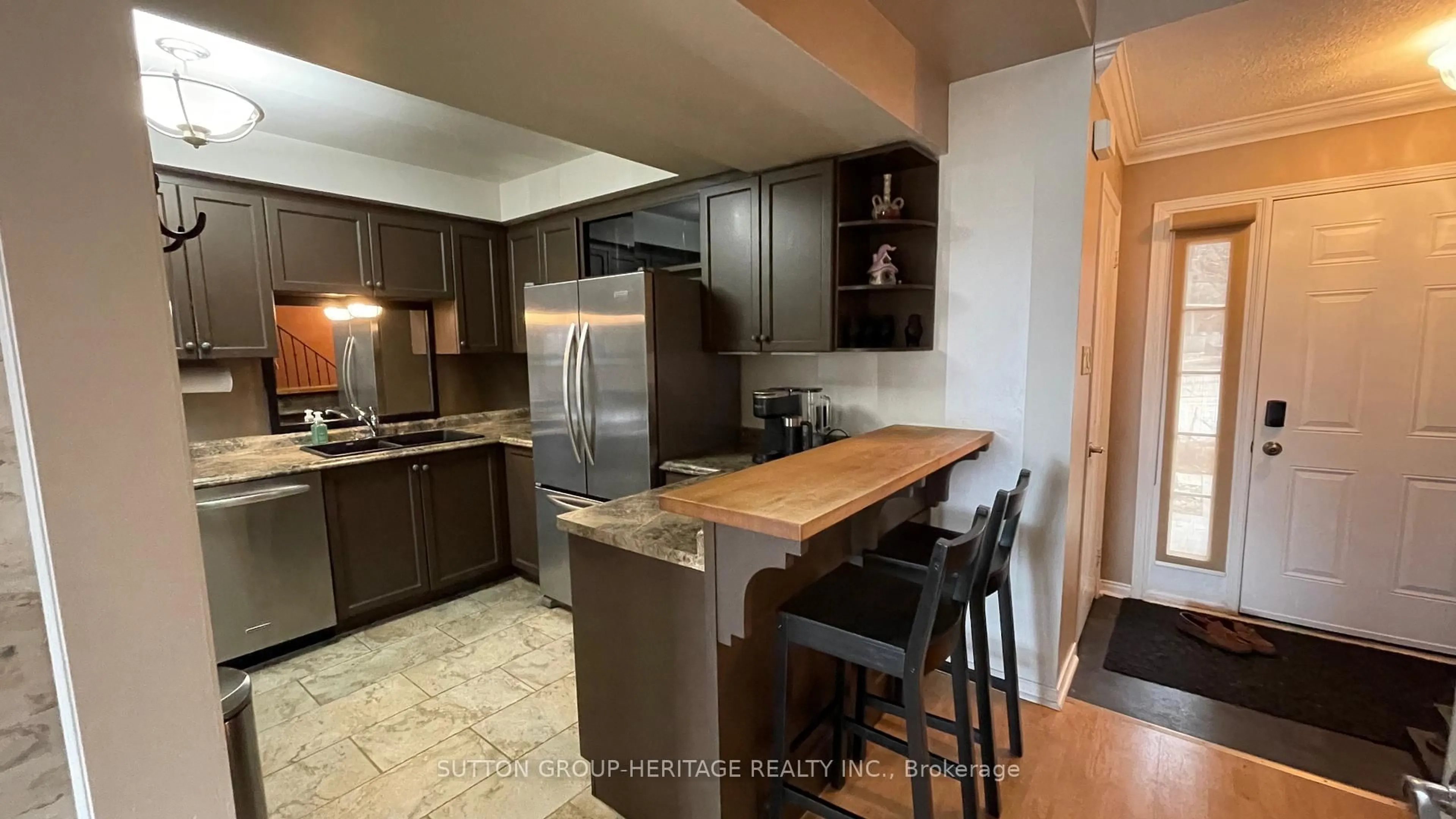 Open concept kitchen, ceramic/tile floor for 492 Laclie St #3, Orillia Ontario L3V 7V2