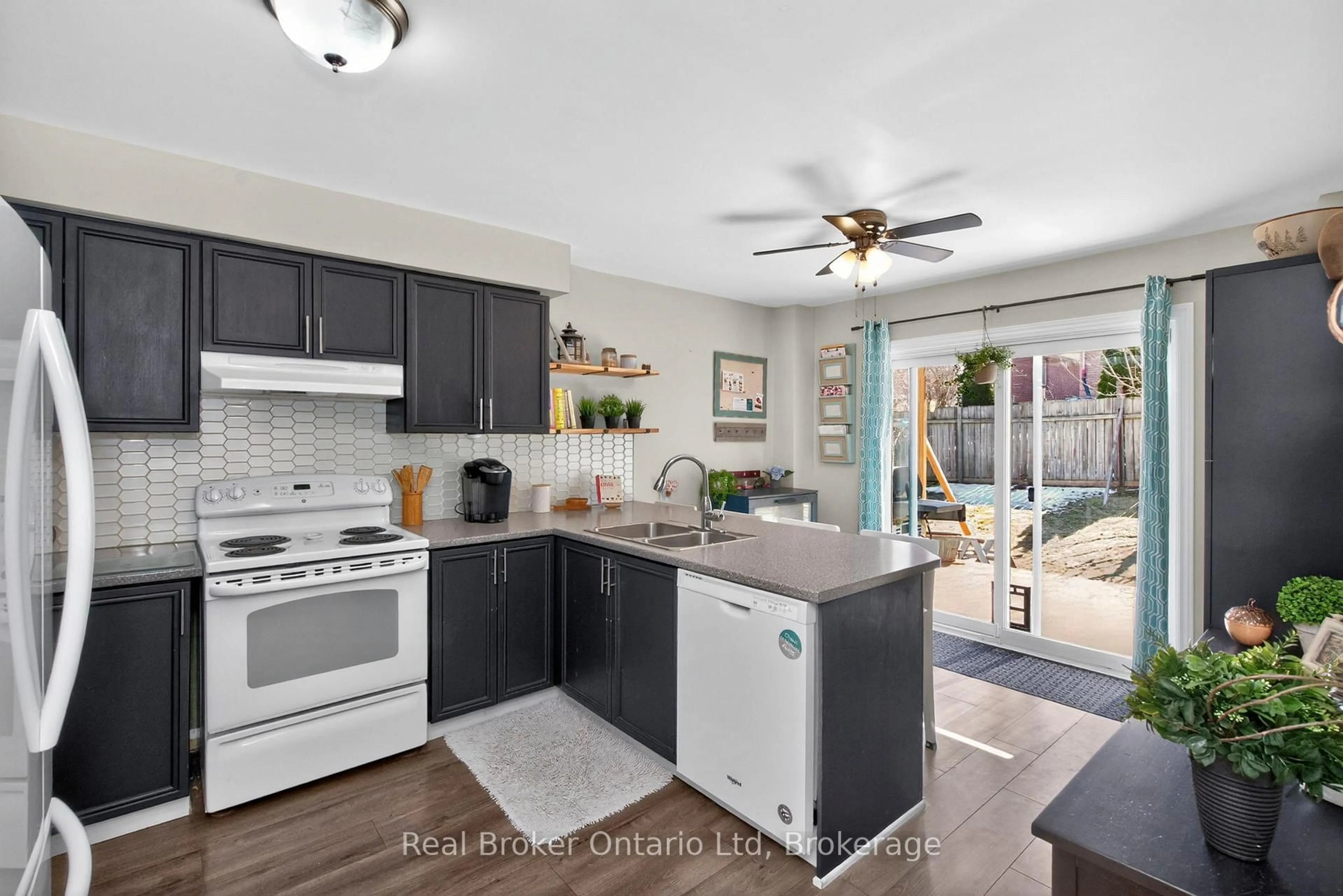 Open concept kitchen, ceramic/tile floor for 1060 Dina Cres, Midland Ontario L4R 5C6