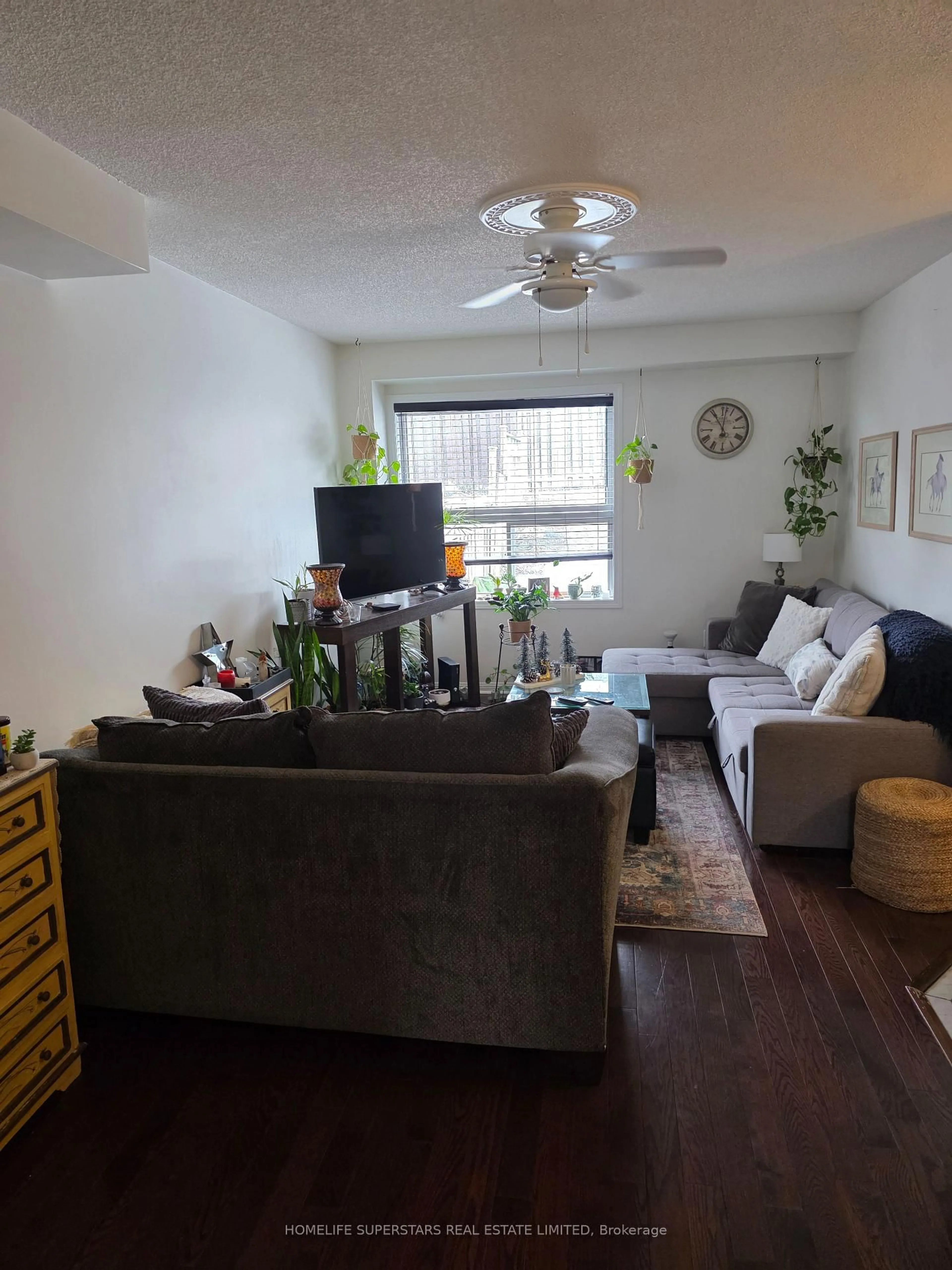 Living room with furniture, wood/laminate floor for 371 Ferndale Dr, Barrie Ontario L4N 9Y8