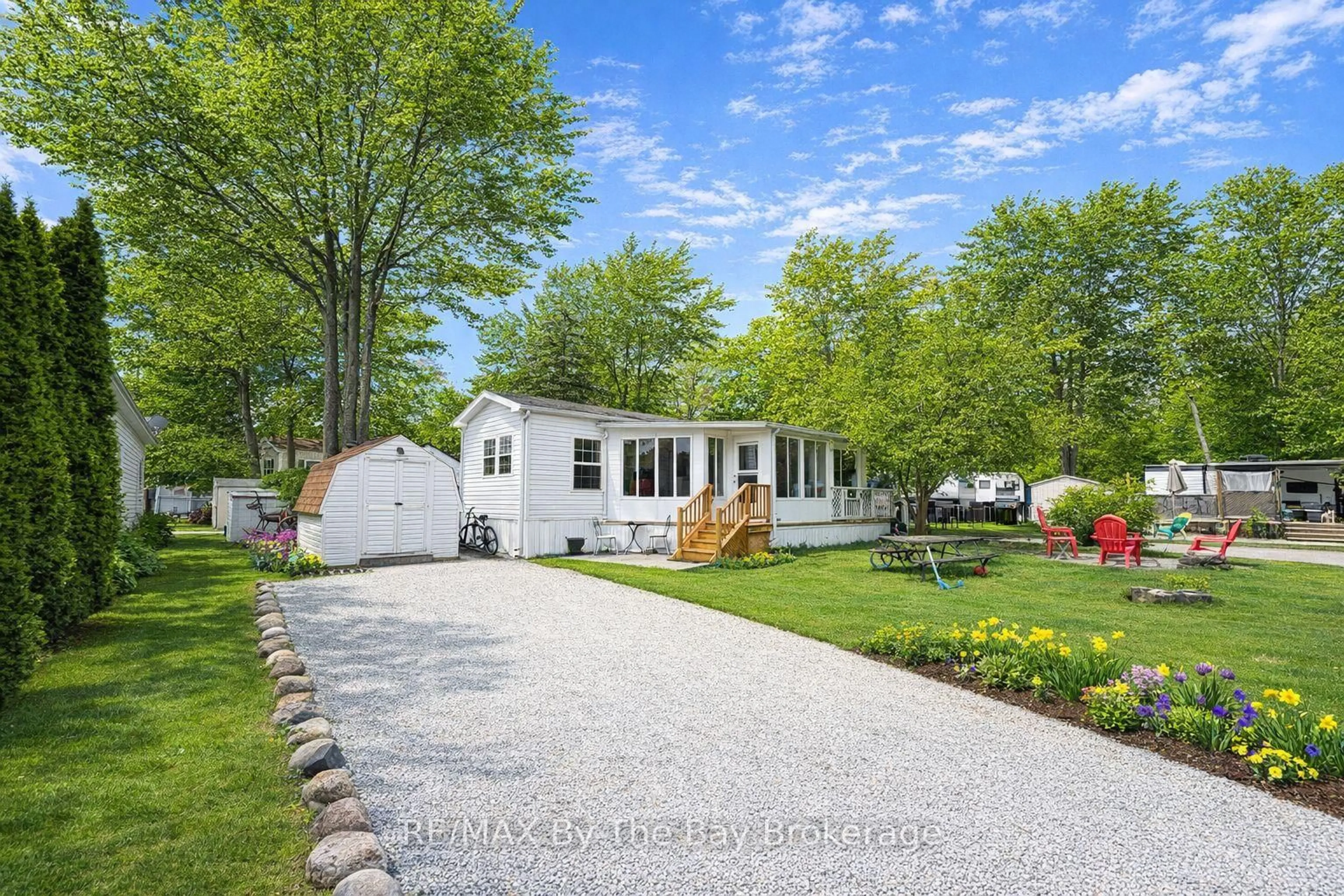 A pic from outside/outdoor area/front of a property/back of a property/a pic from drone, street for 85 THEME PARK Dr #173, Wasaga Beach Ontario L9Z 1X7