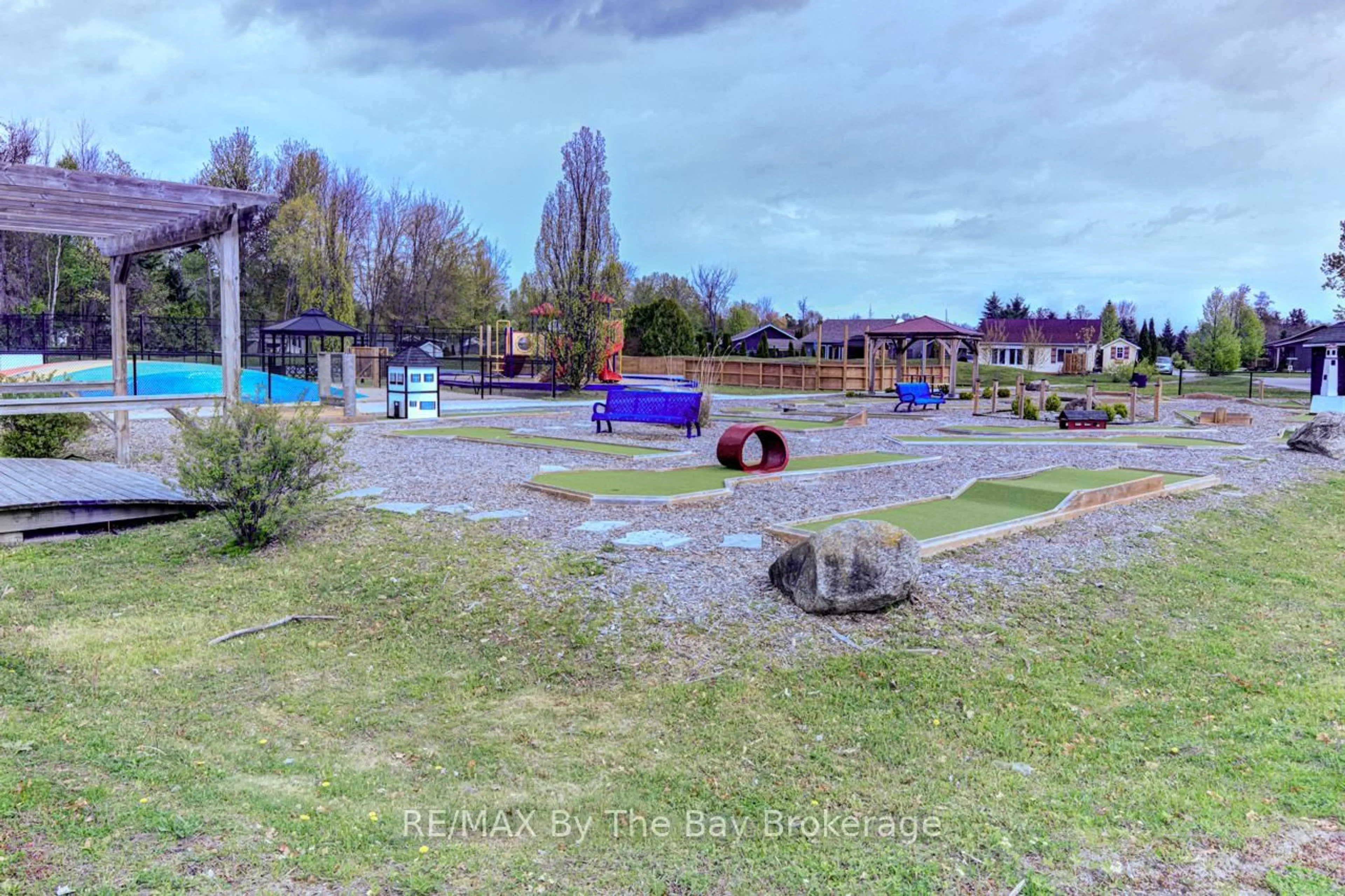 A pic from outside/outdoor area/front of a property/back of a property/a pic from drone, unknown for 85 Theme Park Dr #153, Wasaga Beach Ontario L9Z 1X7