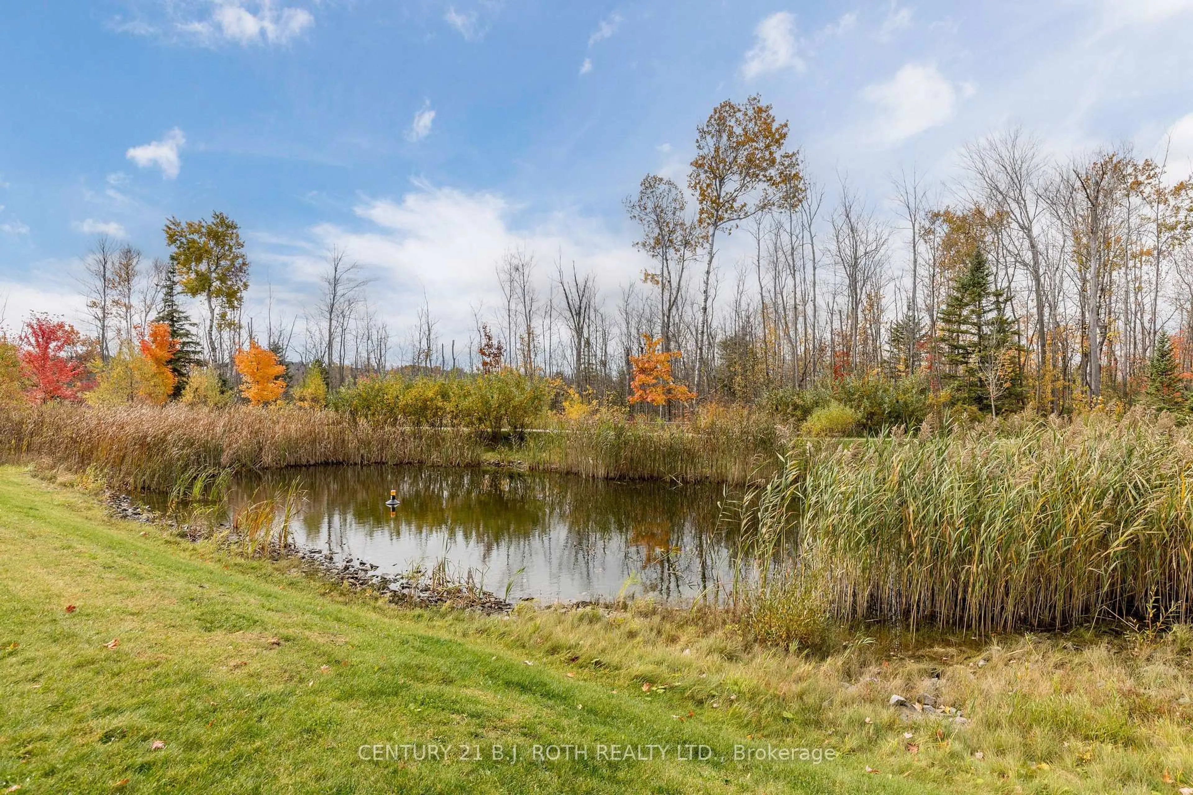 A pic from outside/outdoor area/front of a property/back of a property/a pic from drone, water/lake/river/ocean view for 40 Ferndale Dr #303, Barrie Ontario L4N 2L3