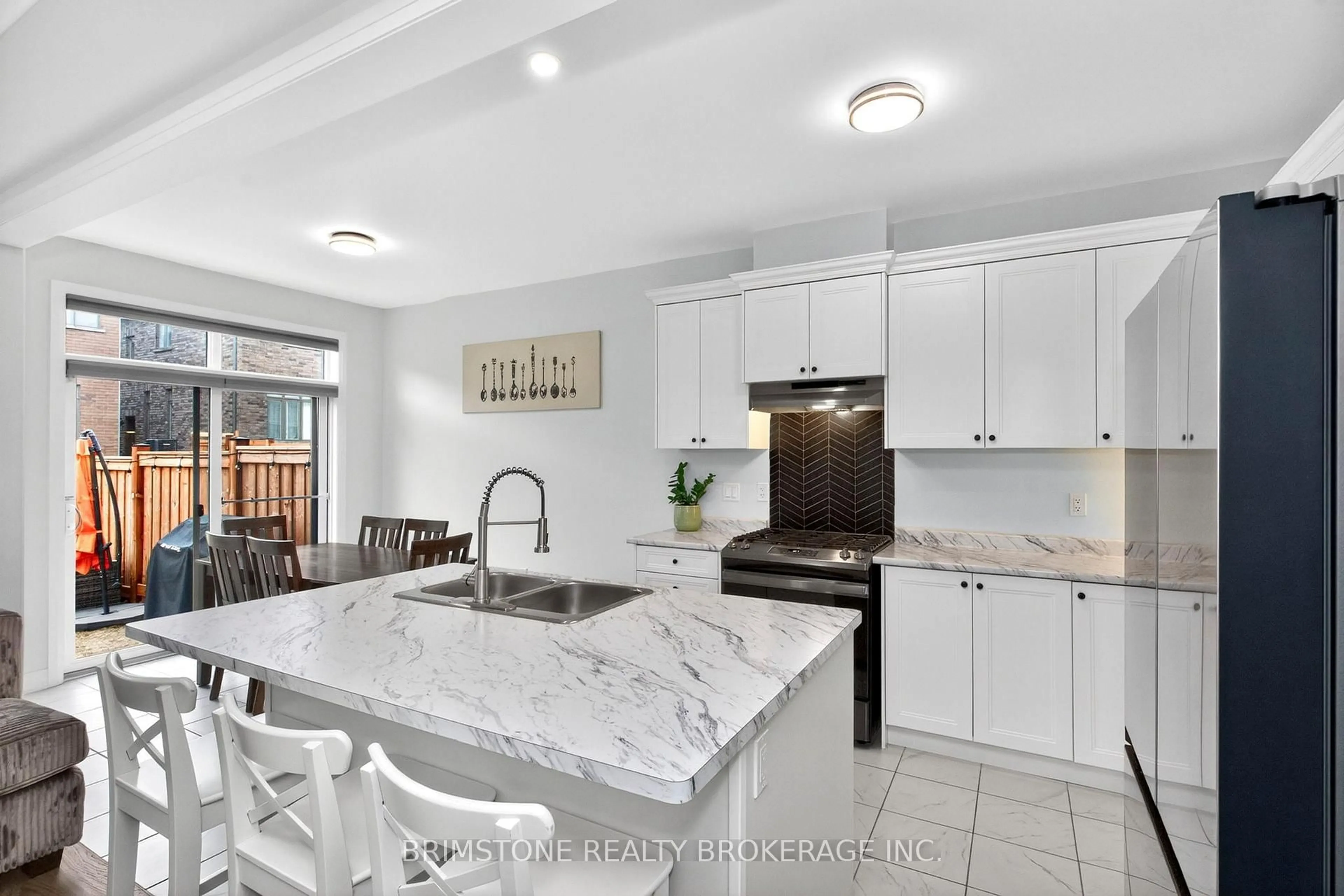 Open concept kitchen, ceramic/tile floor for 63 Copperhill Hts, Barrie Ontario L9J 0K6