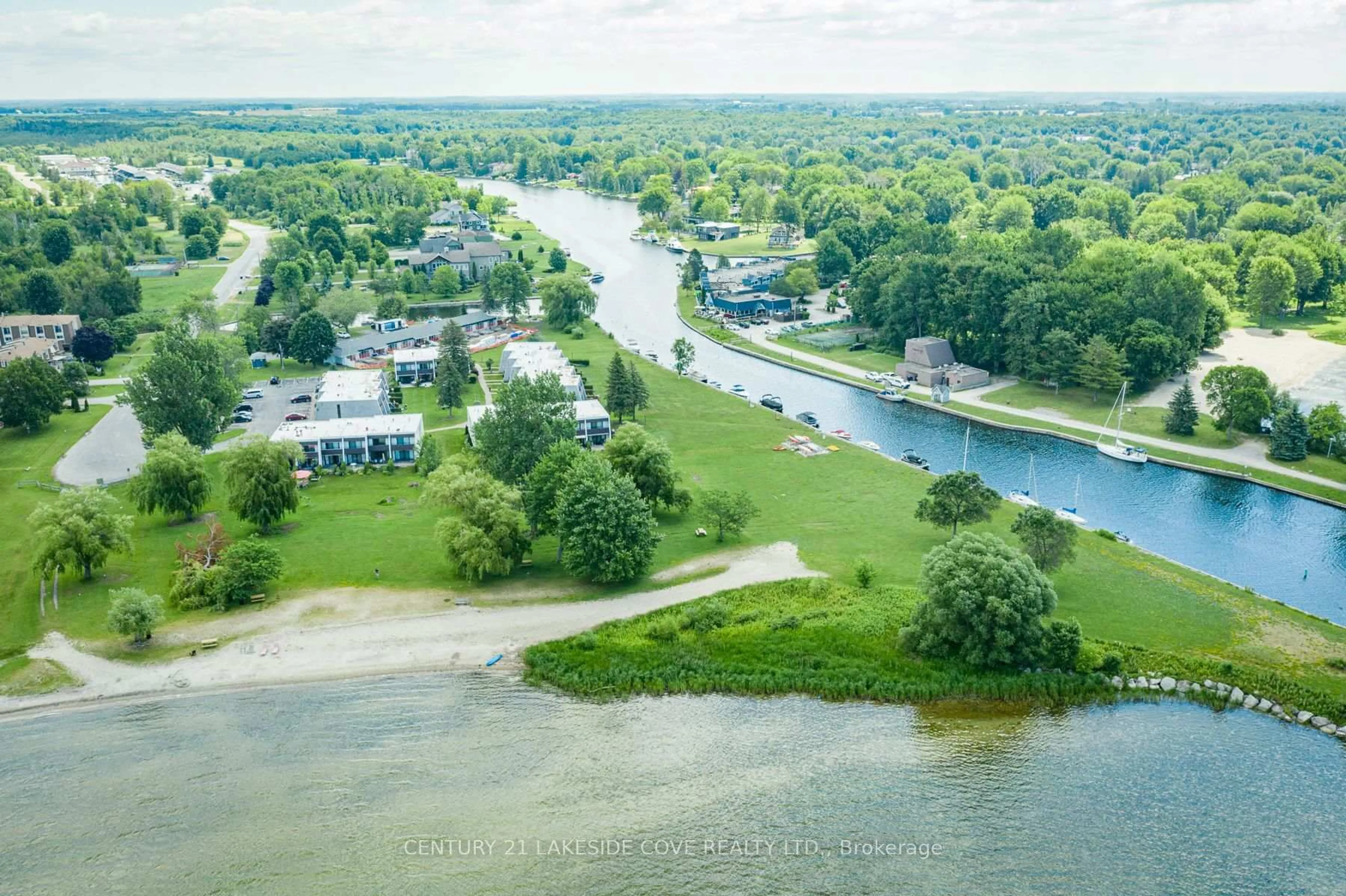 A pic from outside/outdoor area/front of a property/back of a property/a pic from drone, water/lake/river/ocean view for 1 Paradise Blvd #Unit 29, Ramara Ontario L0K 1B0