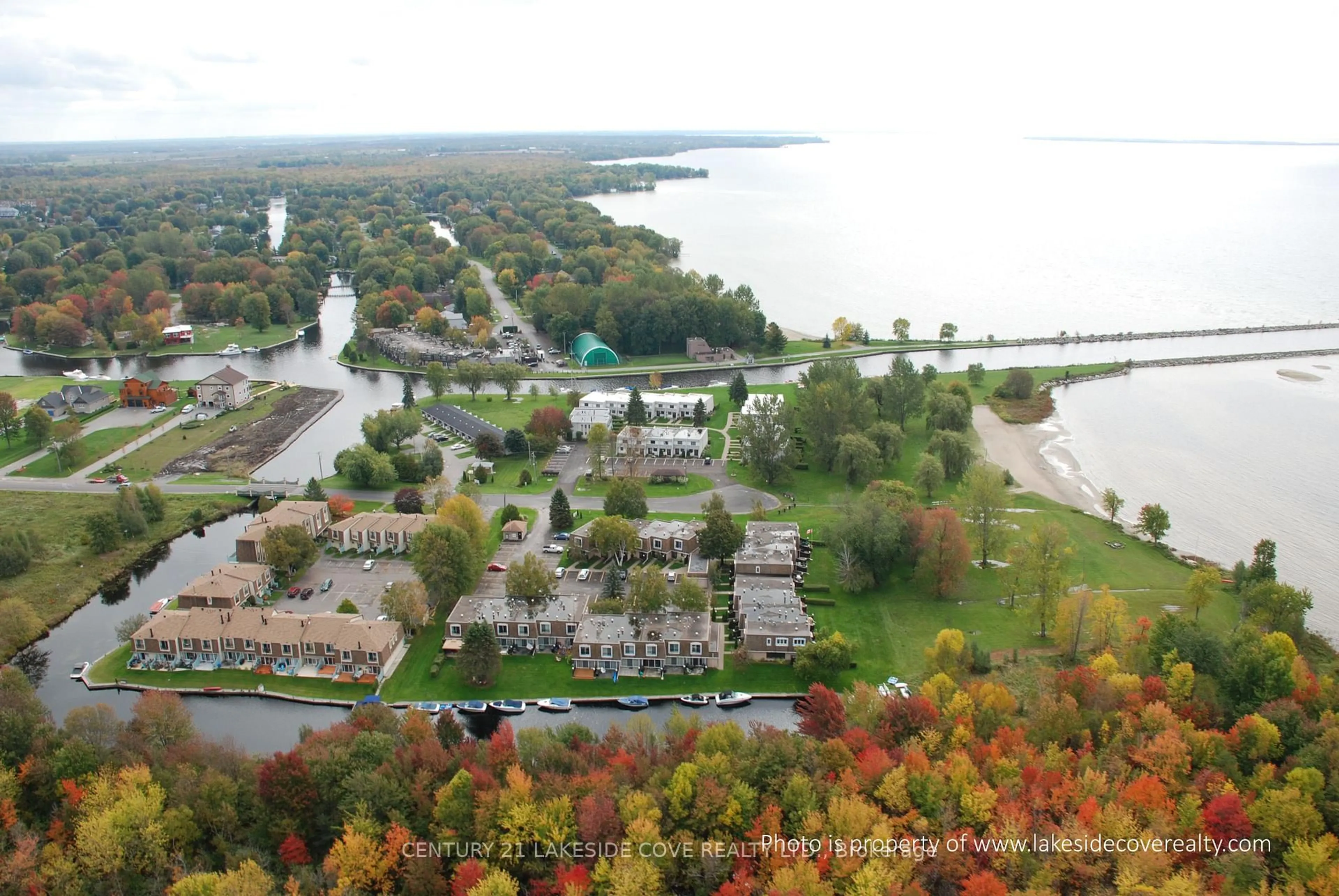A pic from outside/outdoor area/front of a property/back of a property/a pic from drone, water/lake/river/ocean view for 1 Paradise Blvd #Unit 29, Ramara Ontario L0K 1B0