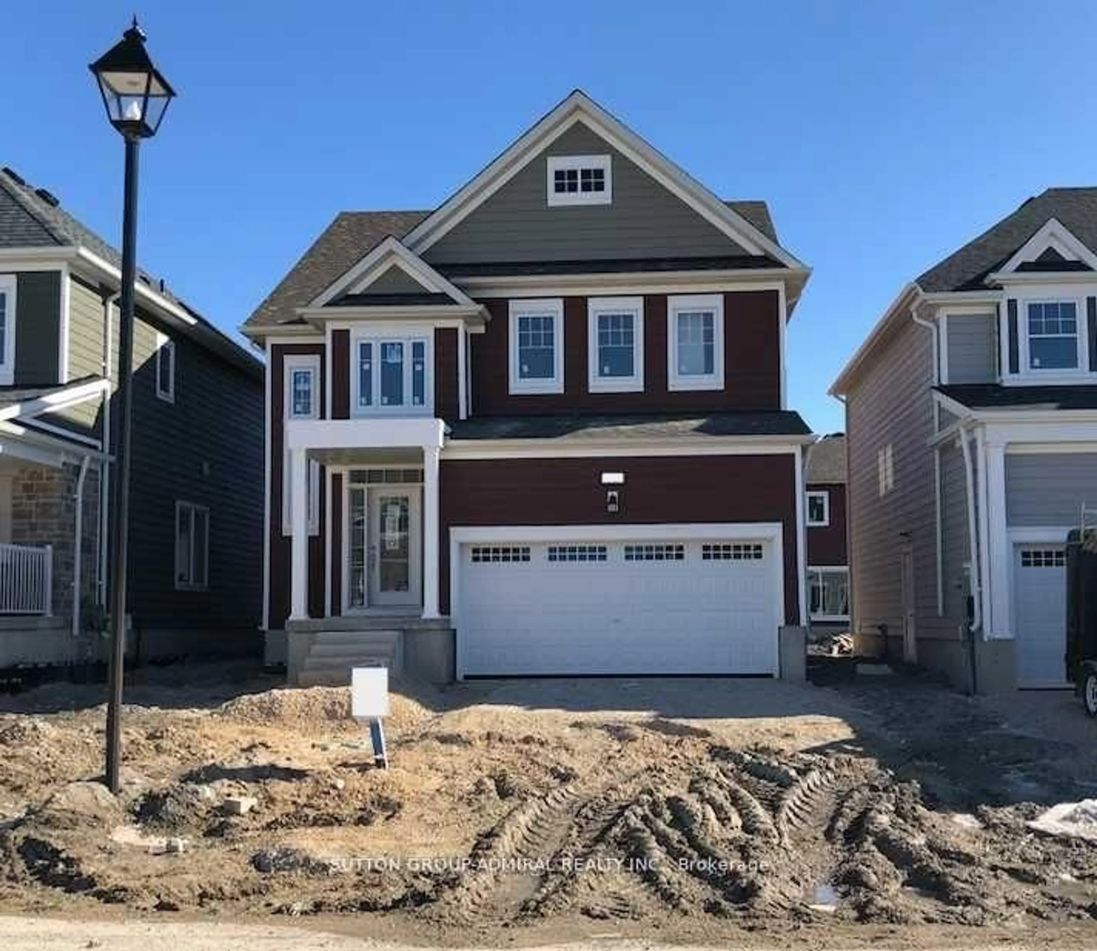 Home with brick exterior material, street for 12 Bobolink Dr, Wasaga Beach Ontario L9Z 0J2