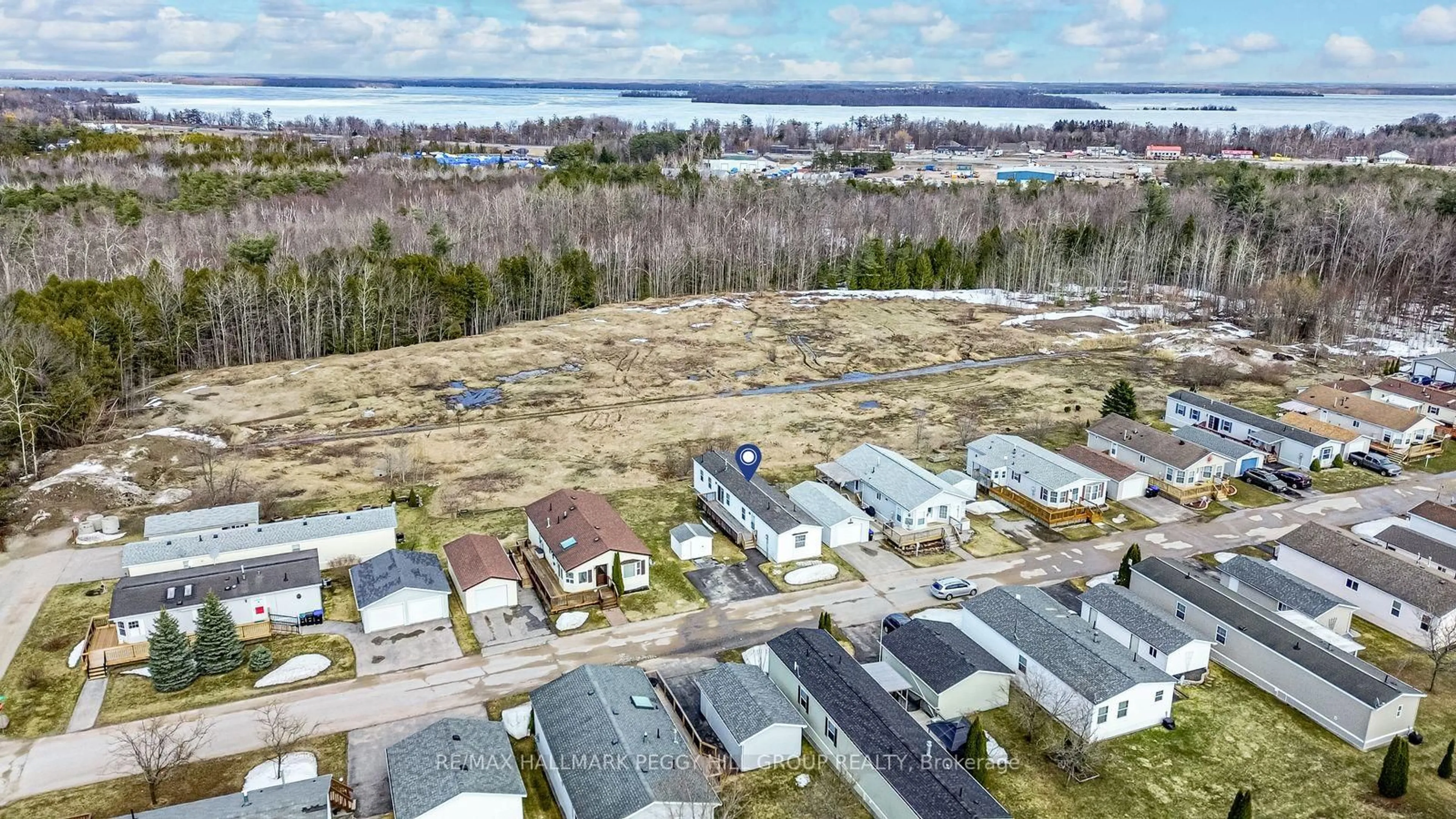 A pic from outside/outdoor area/front of a property/back of a property/a pic from drone, water/lake/river/ocean view for 4105 Haines St, Severn Ontario L3V 0V4