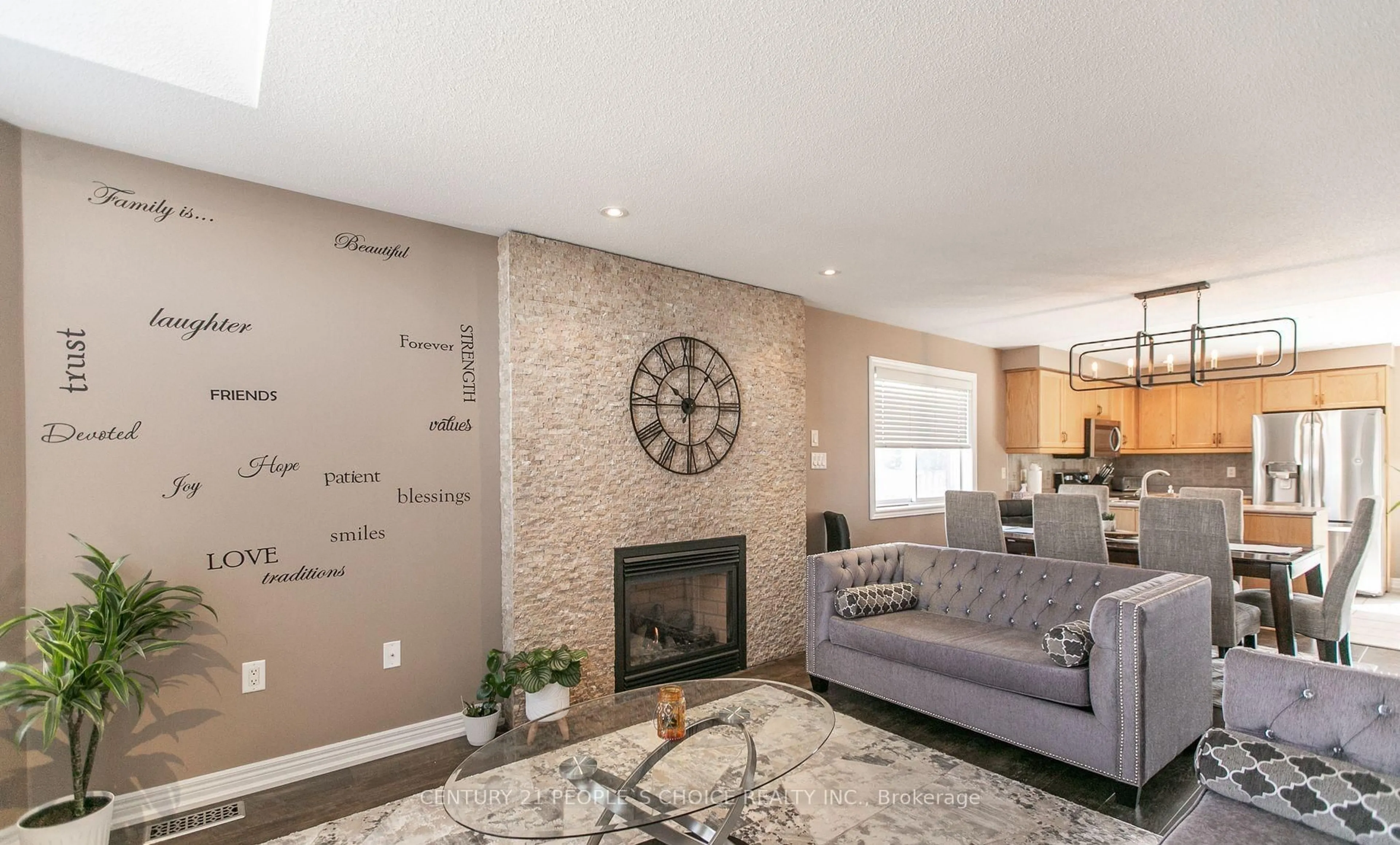 Living room with furniture, ceramic/tile floor for 55 MARSELLUS Dr, Barrie Ontario L4N 8S6