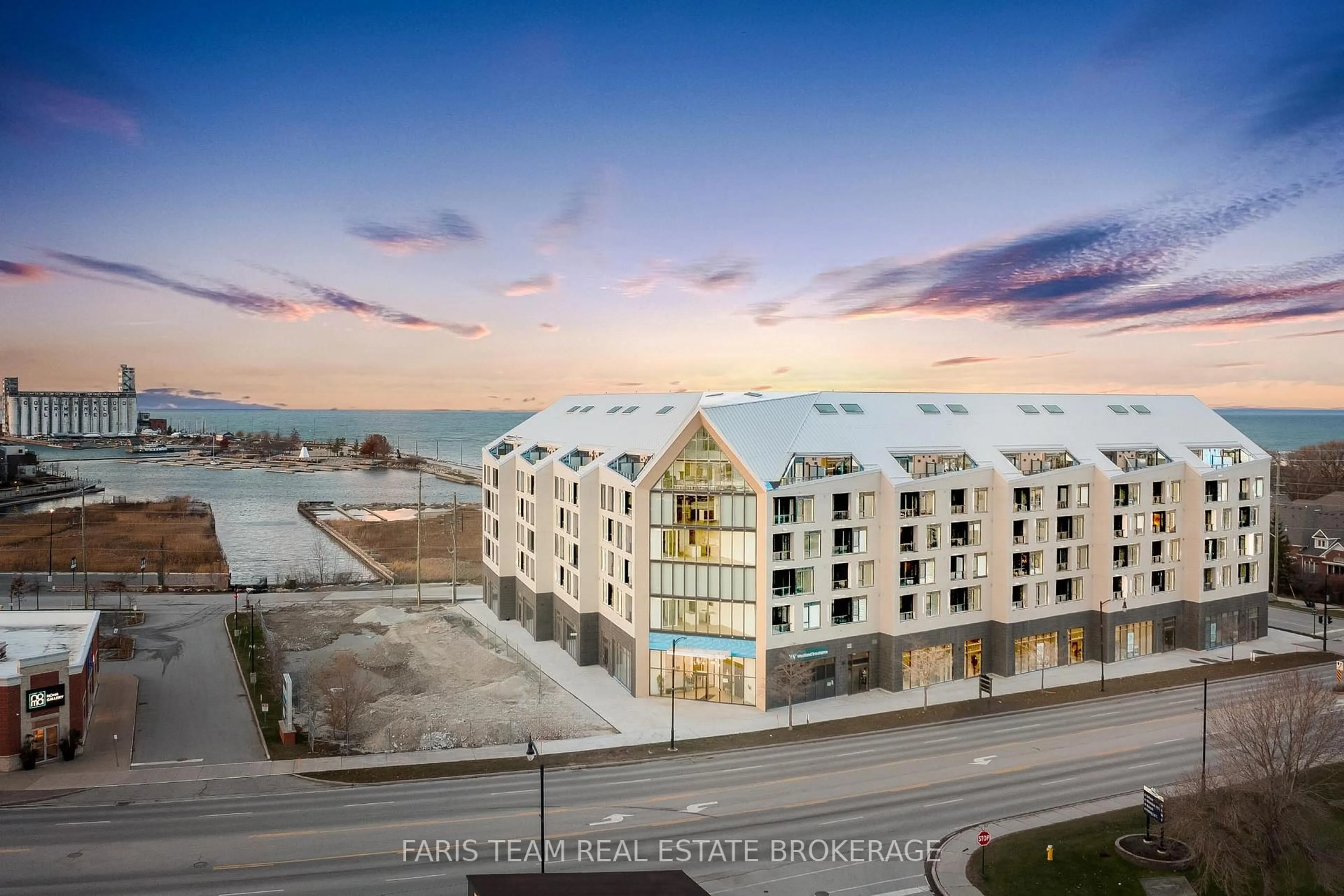 A pic from outside/outdoor area/front of a property/back of a property/a pic from drone, unknown for 31 Huron St #611, Collingwood Ontario L9Y 0E8