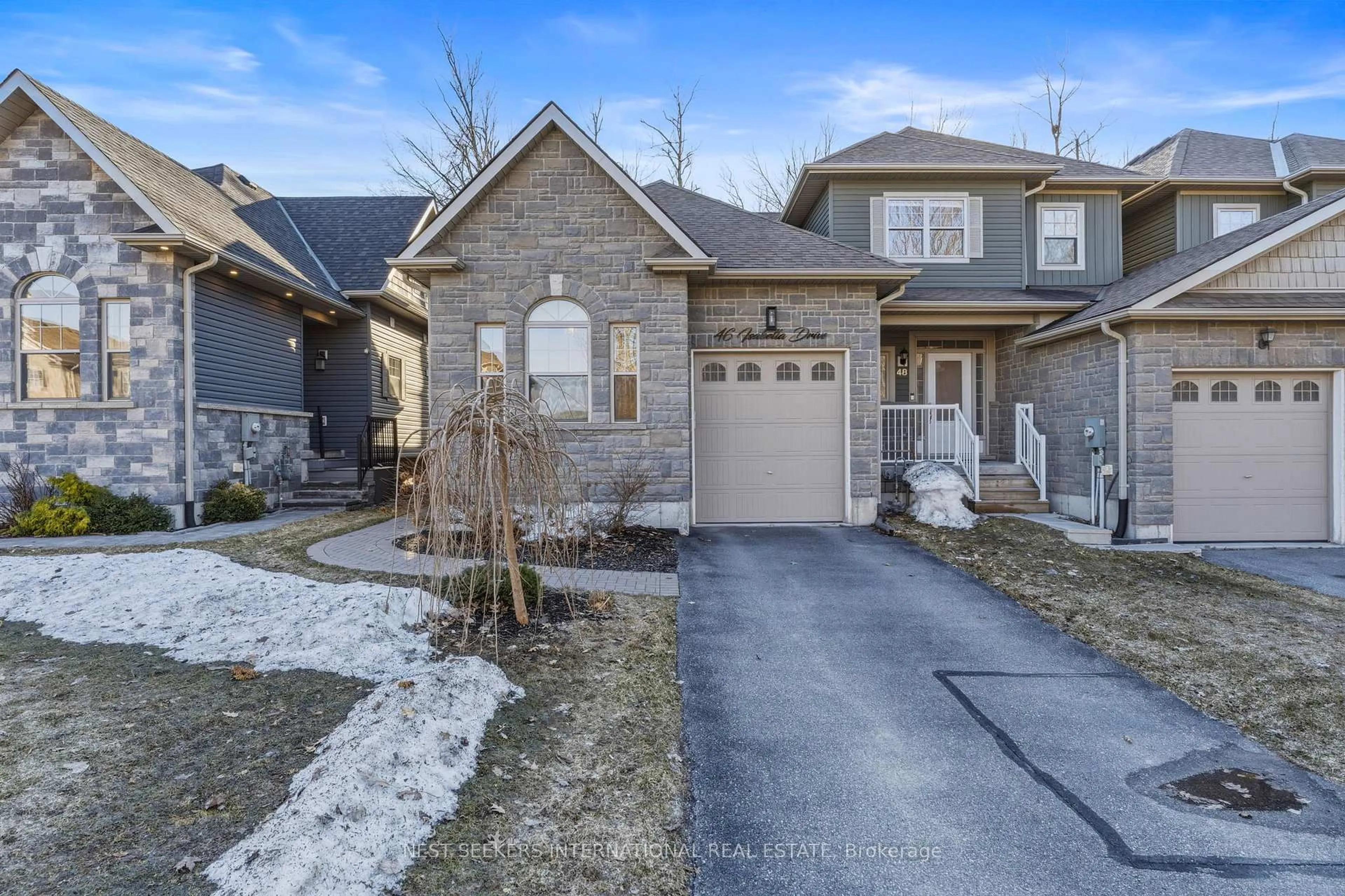 Home with brick exterior material, street for 46 Isabella Dr, Orillia Ontario L3V 0E2